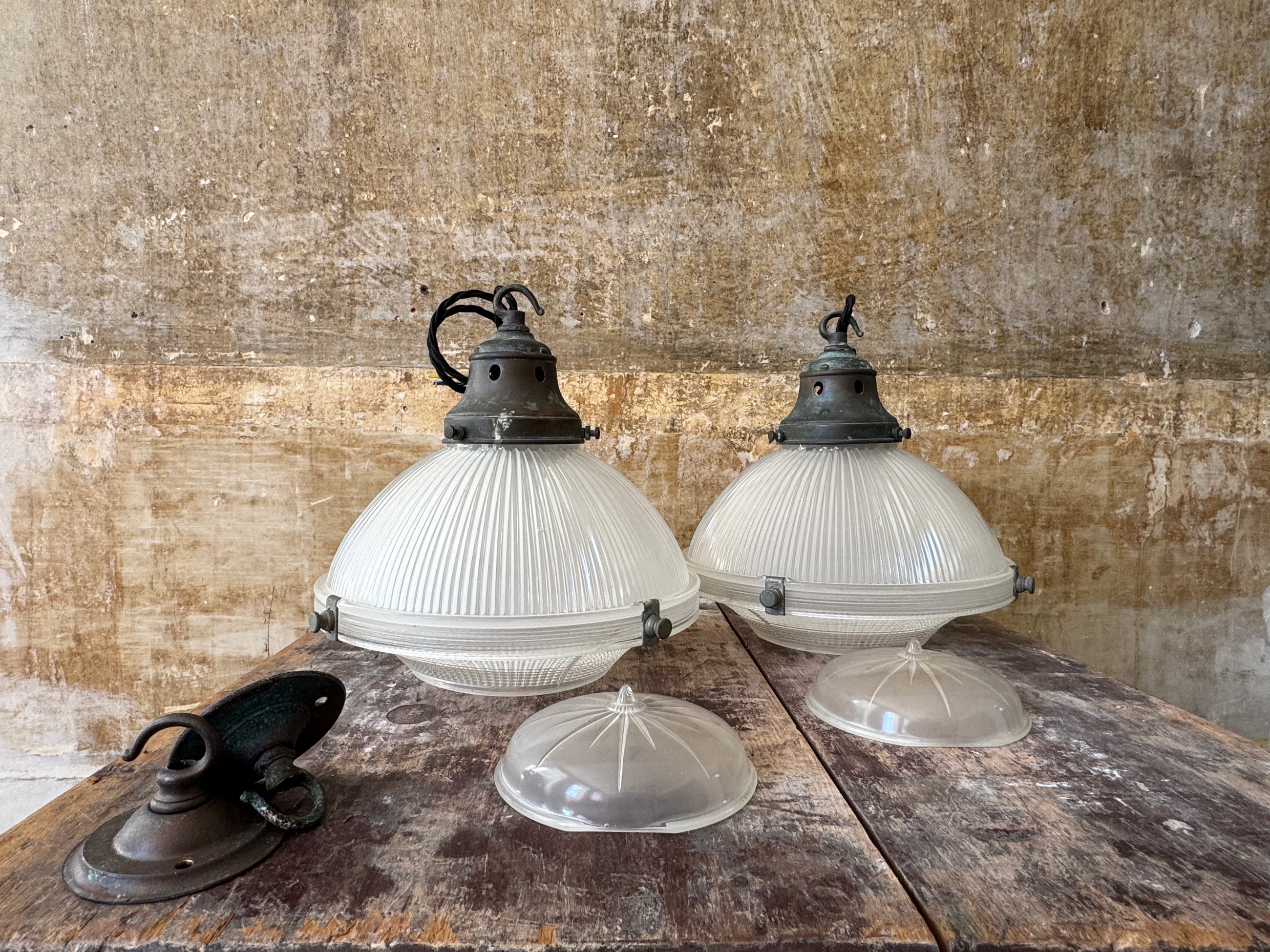 A Pair of Holophane Pendant lights