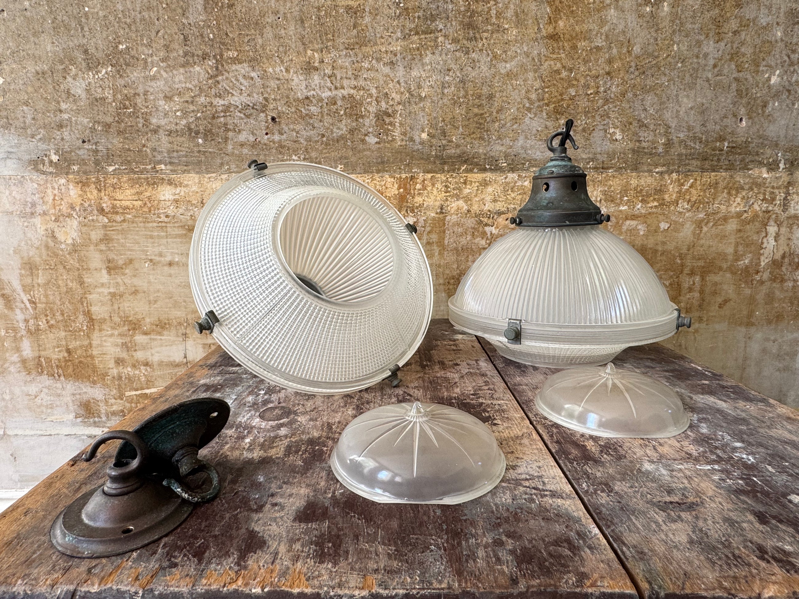 A Pair of Holophane Pendant lights