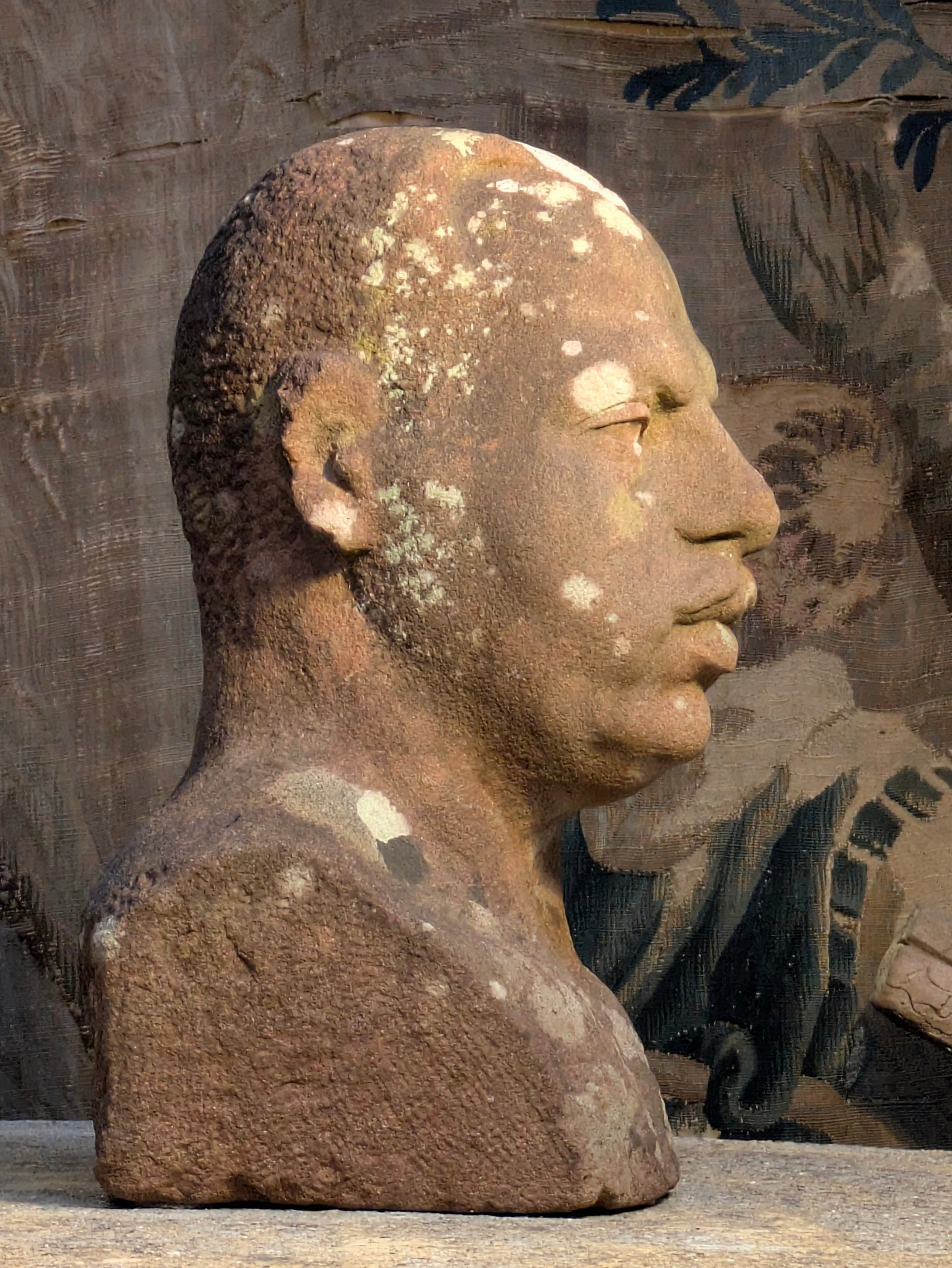 A Carved Stone Male Bust