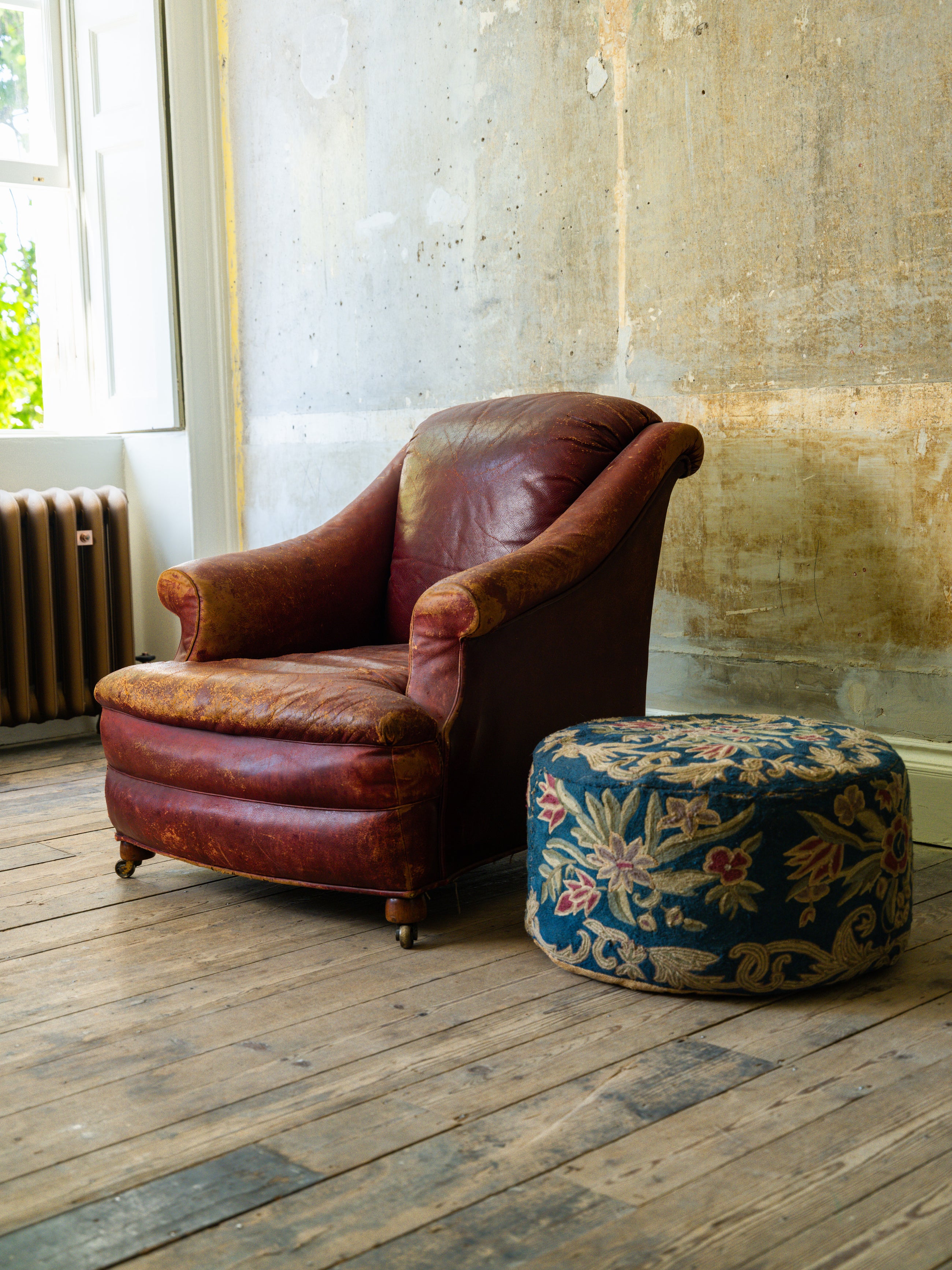 A 19th Century Crewel Work Pouffe