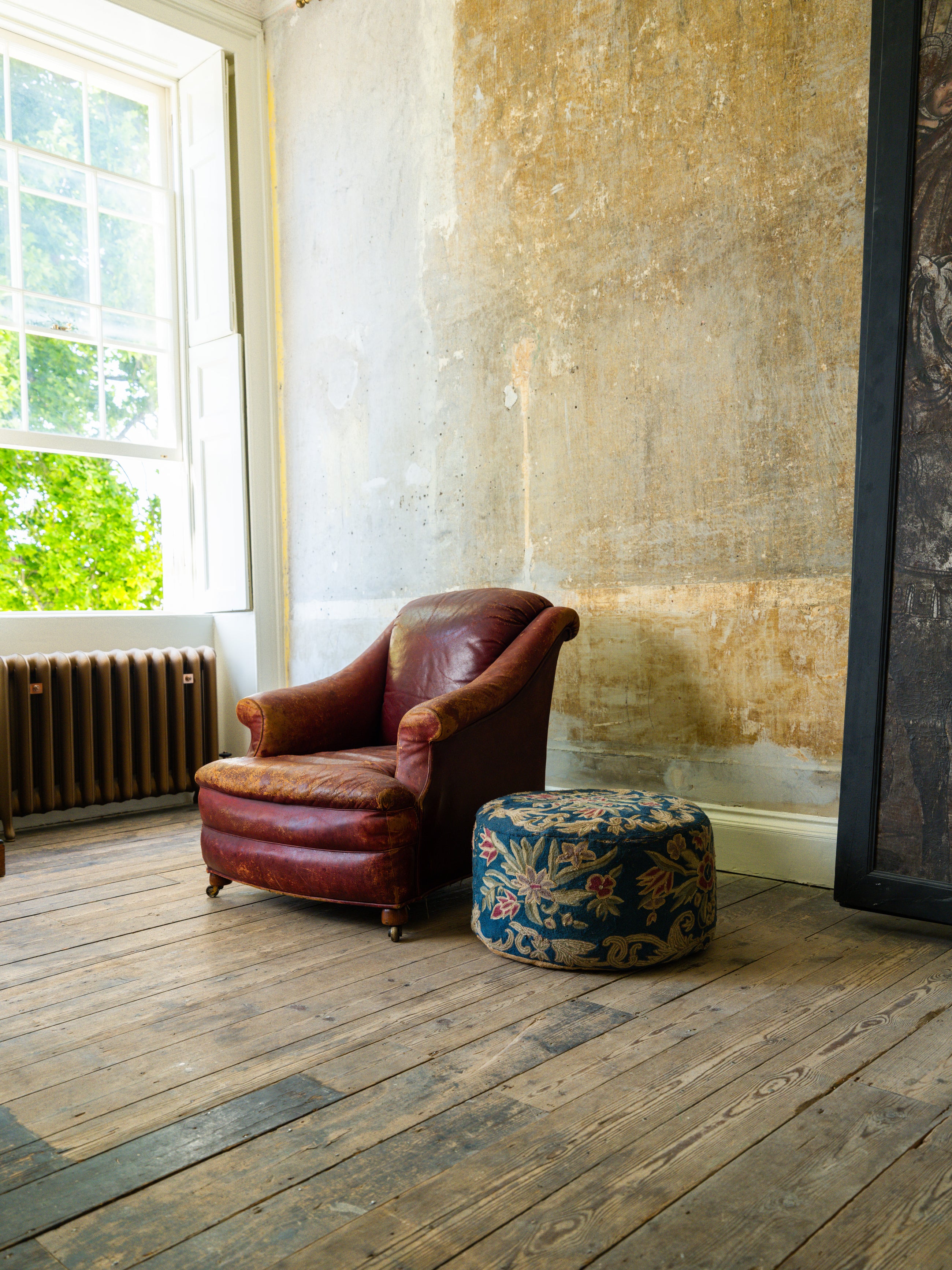 A 19th Century Crewel Work Pouffe