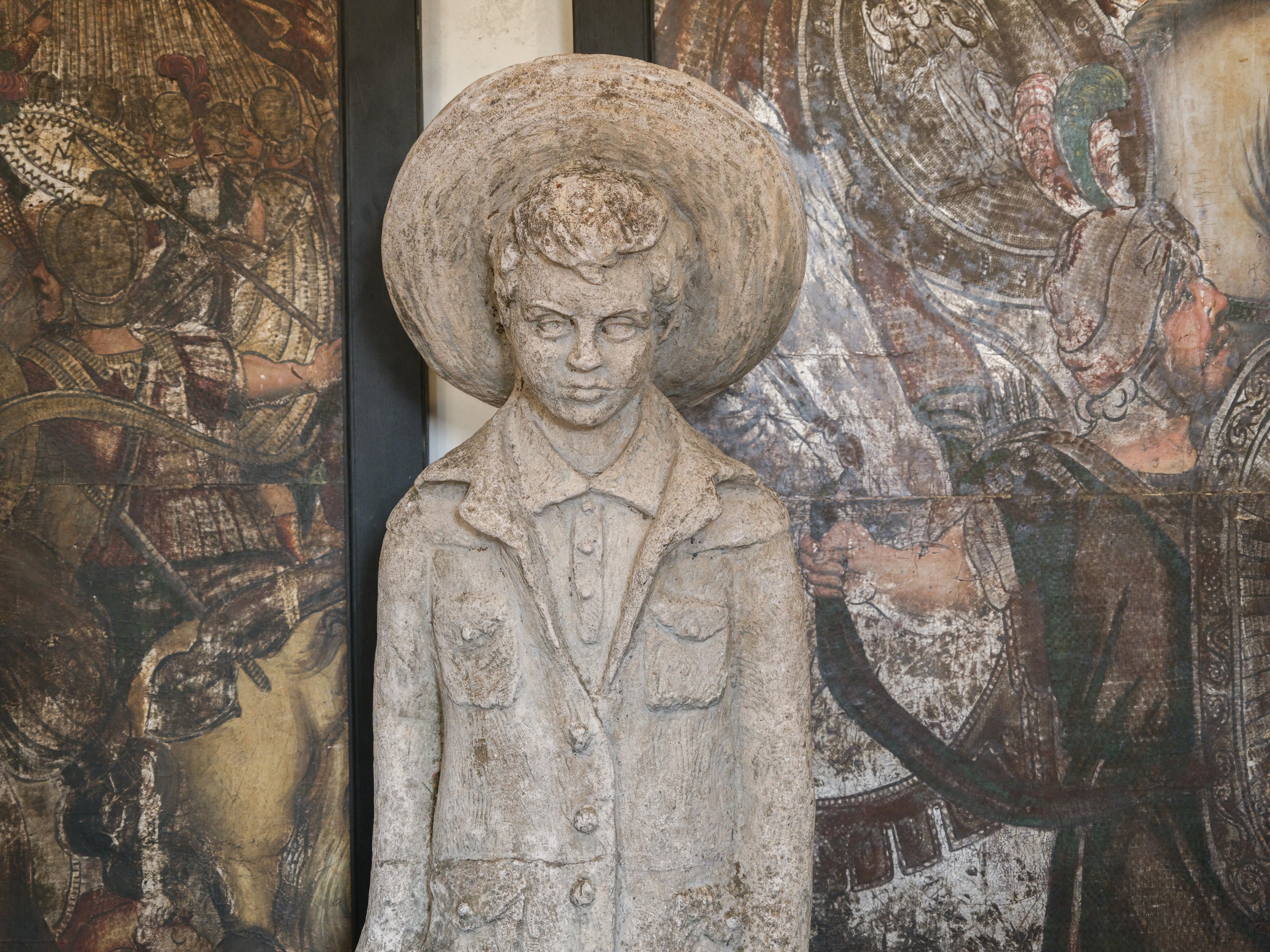 Statue of a Tall Boy