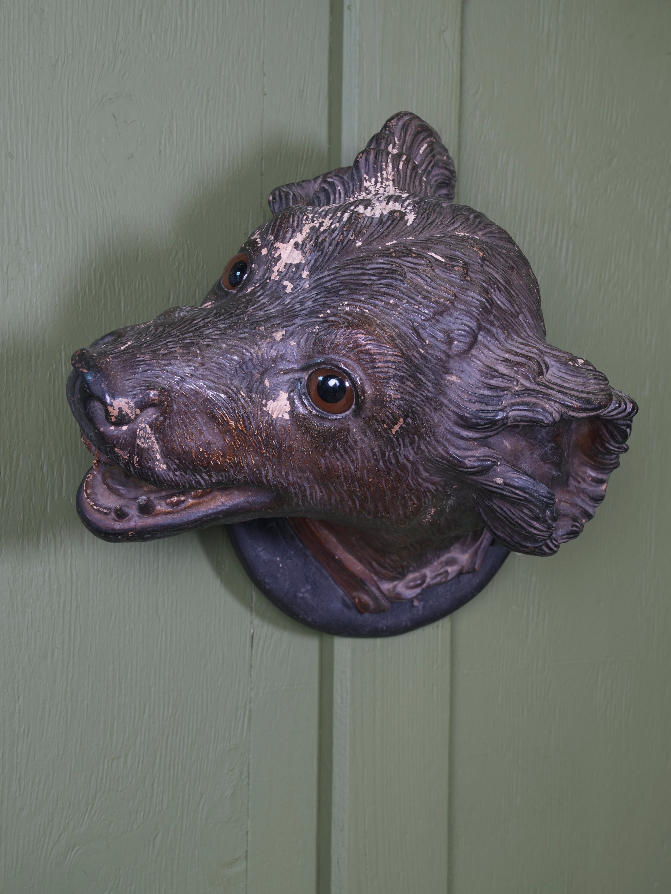 An Austrian Terracotta Dogs Head Mount