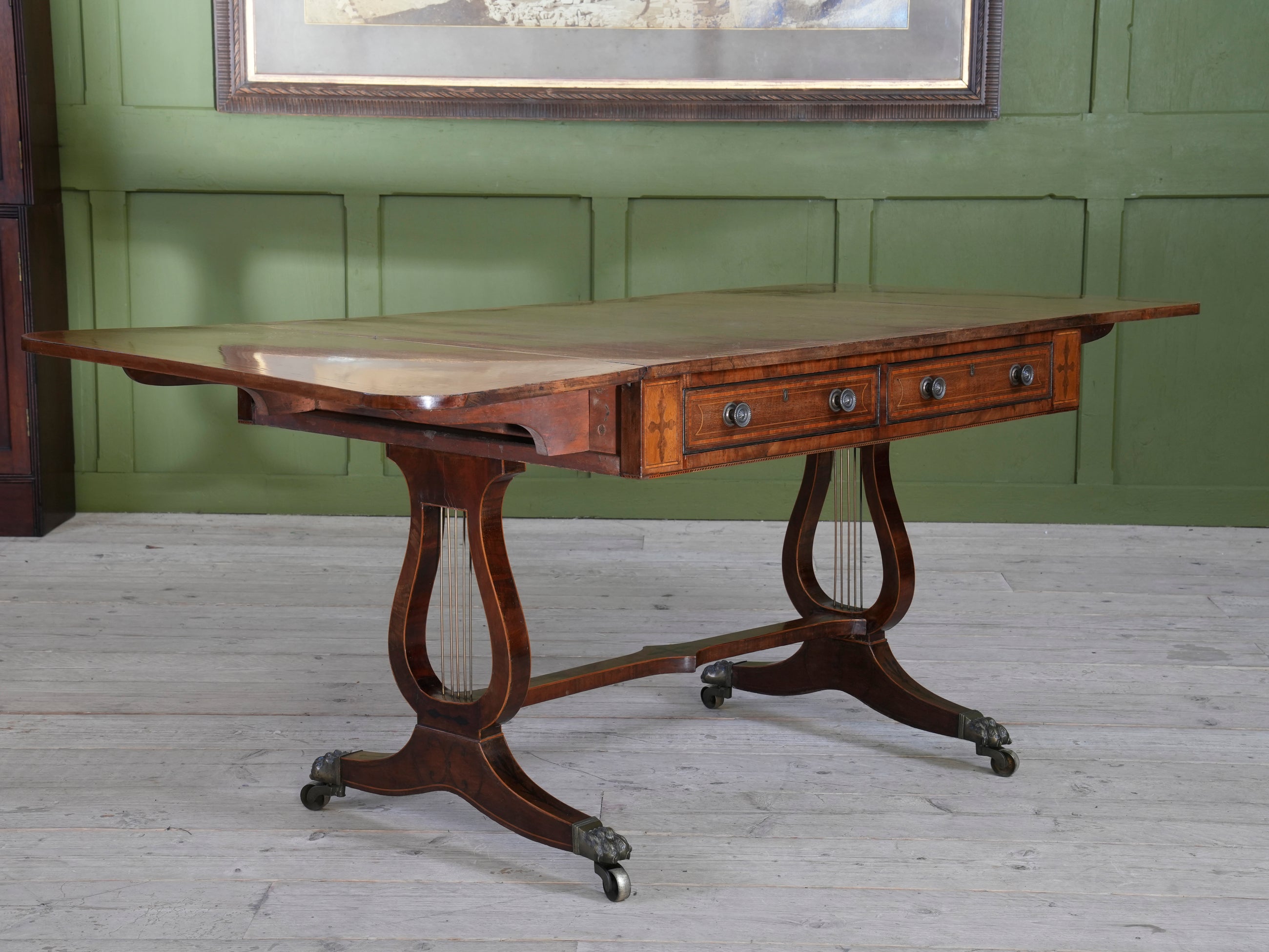 A Regency Lyre Support Sofa Table