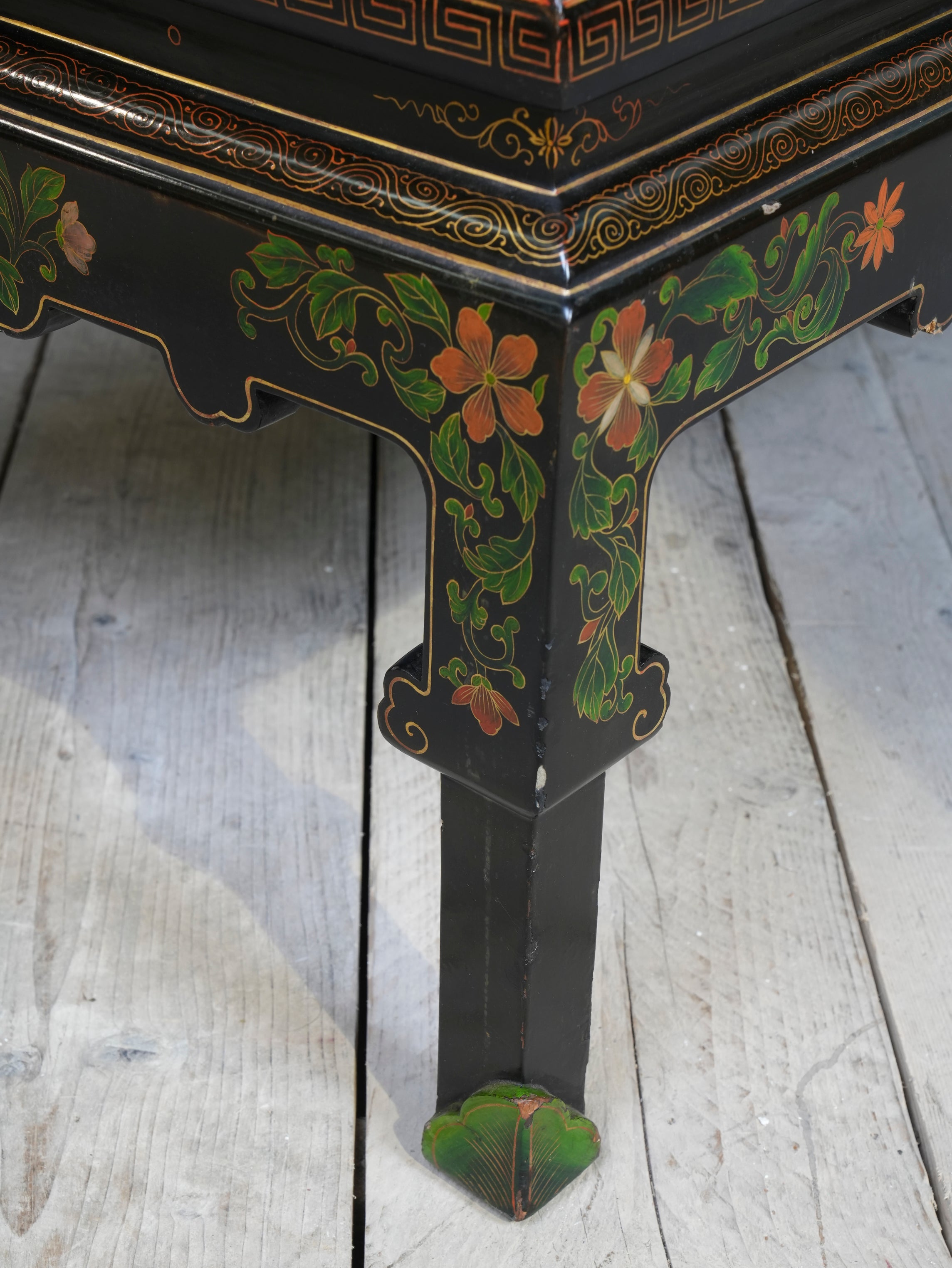 An Ebonised Coffee Table with Inset Cloisonne Panel
