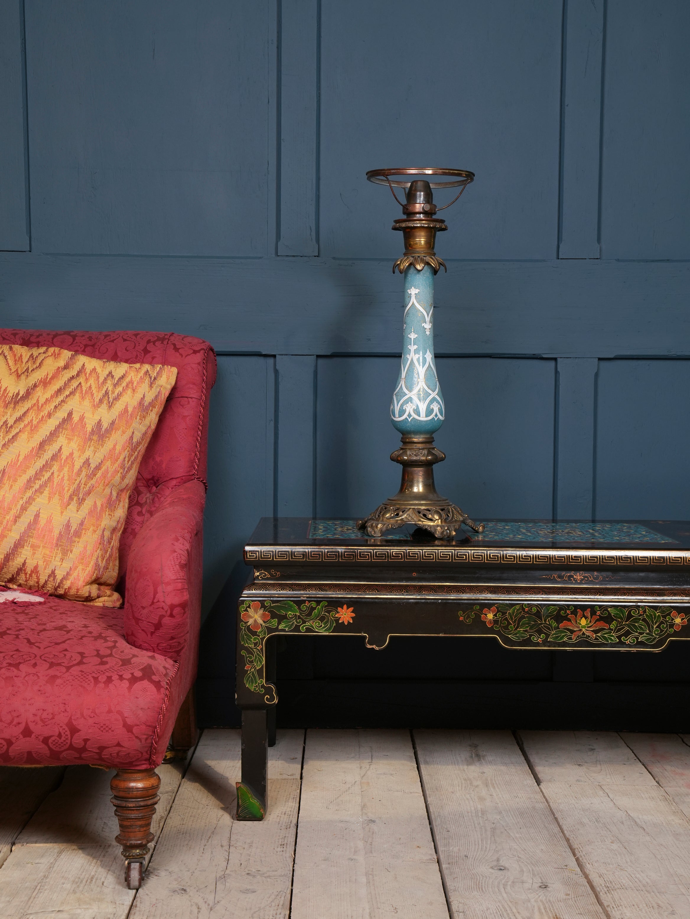 An Ebonised Coffee Table with Inset Cloisonne Panel