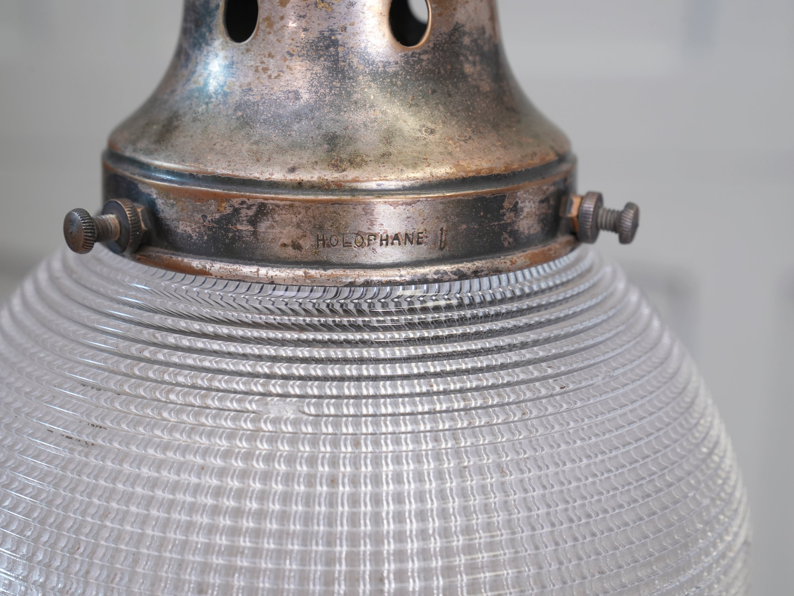 A Single Holophane Globe Pendant Light