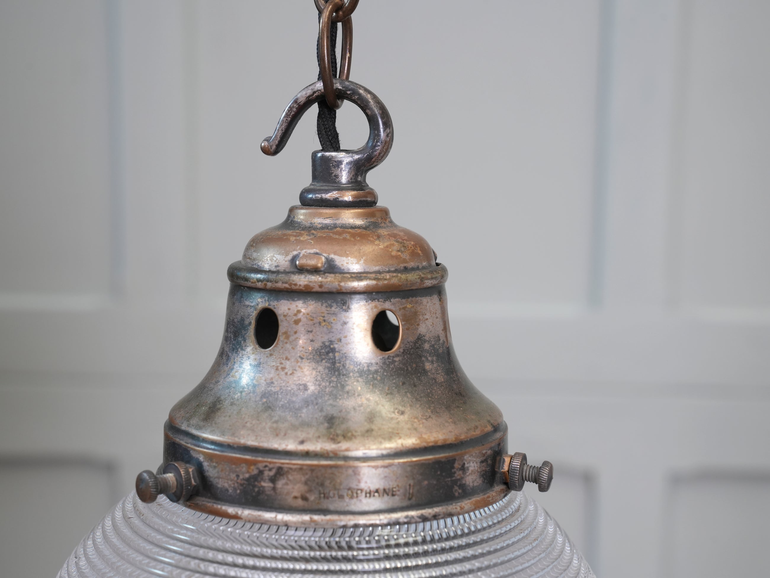 A Single Holophane Globe Pendant Light