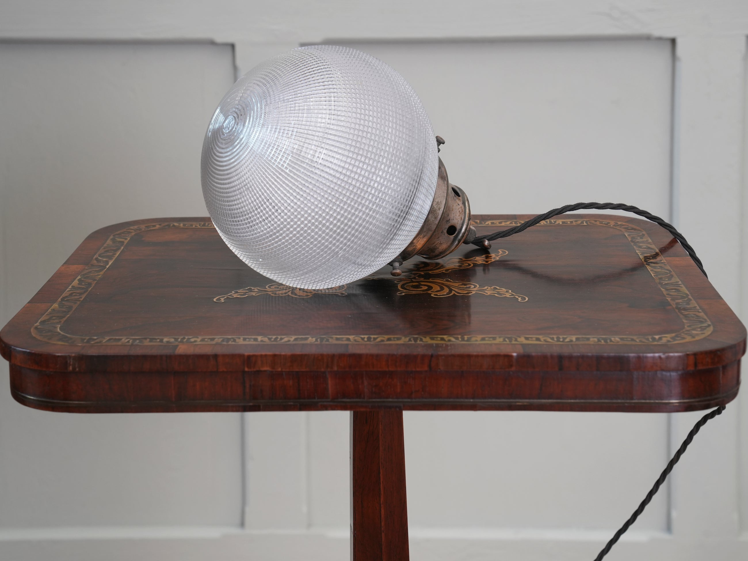 A Single Holophane Globe Pendant Light
