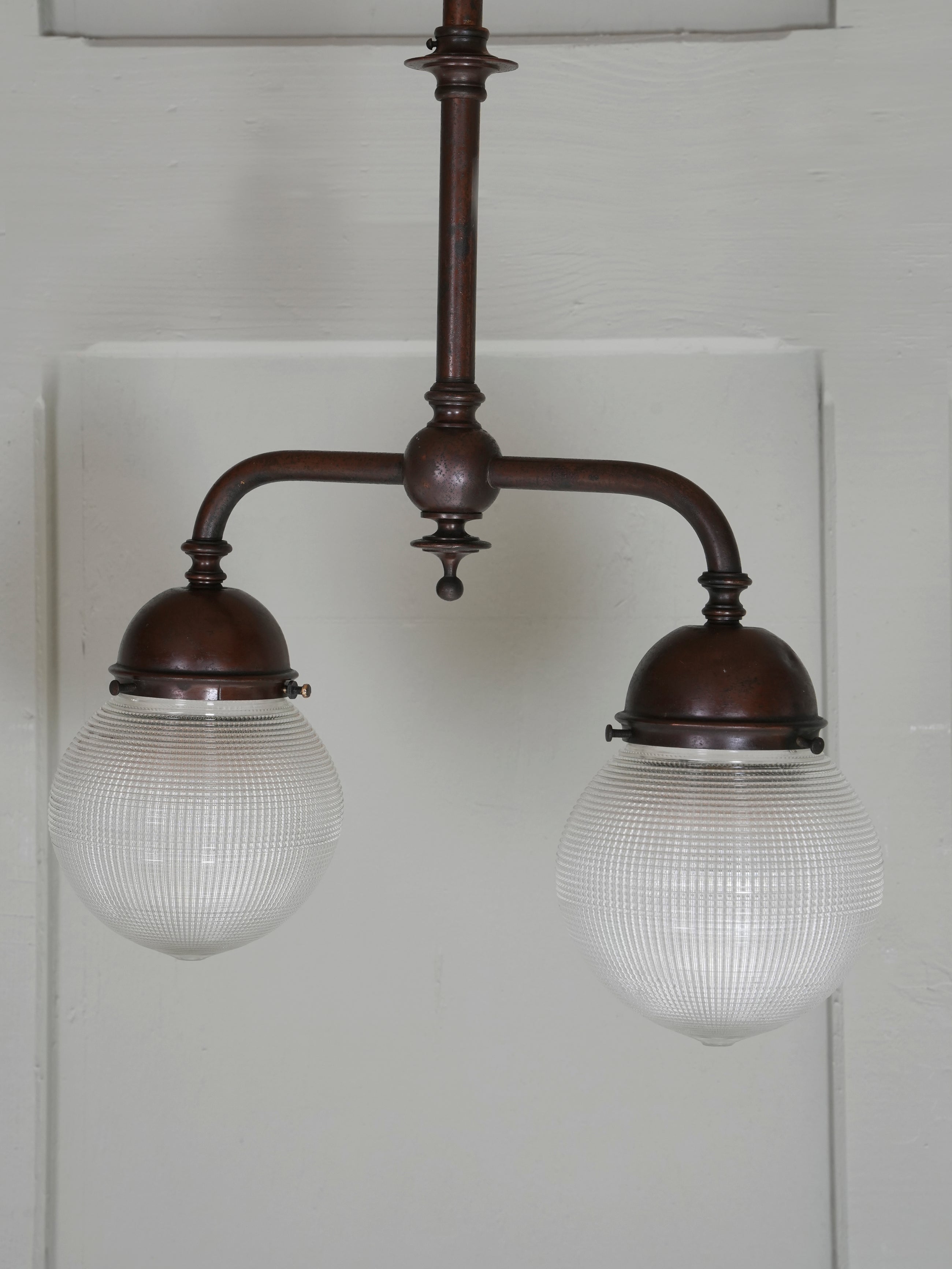 A Twin Holophane Ceiling Light
