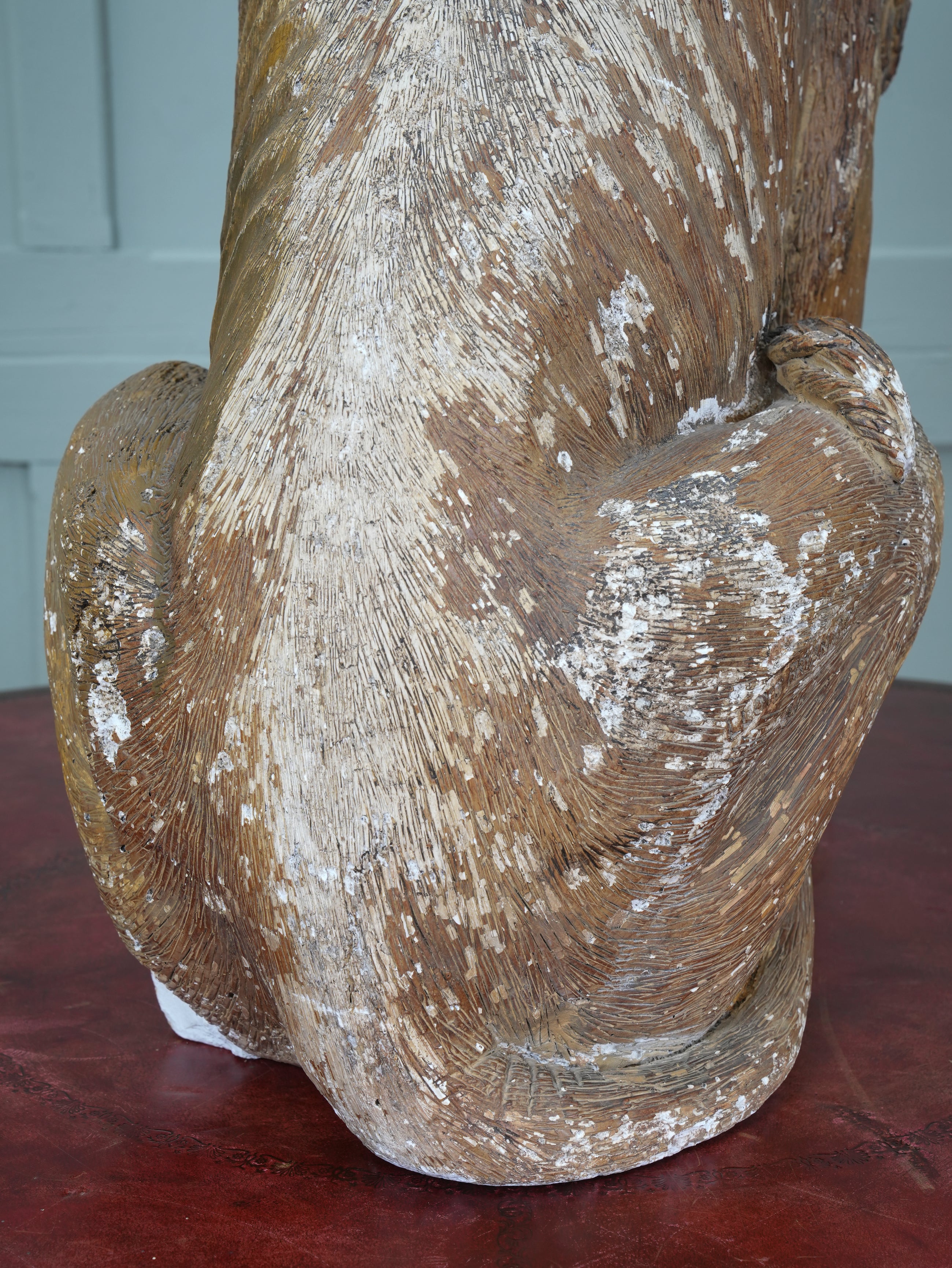 A Painted Plaster Seated Lion