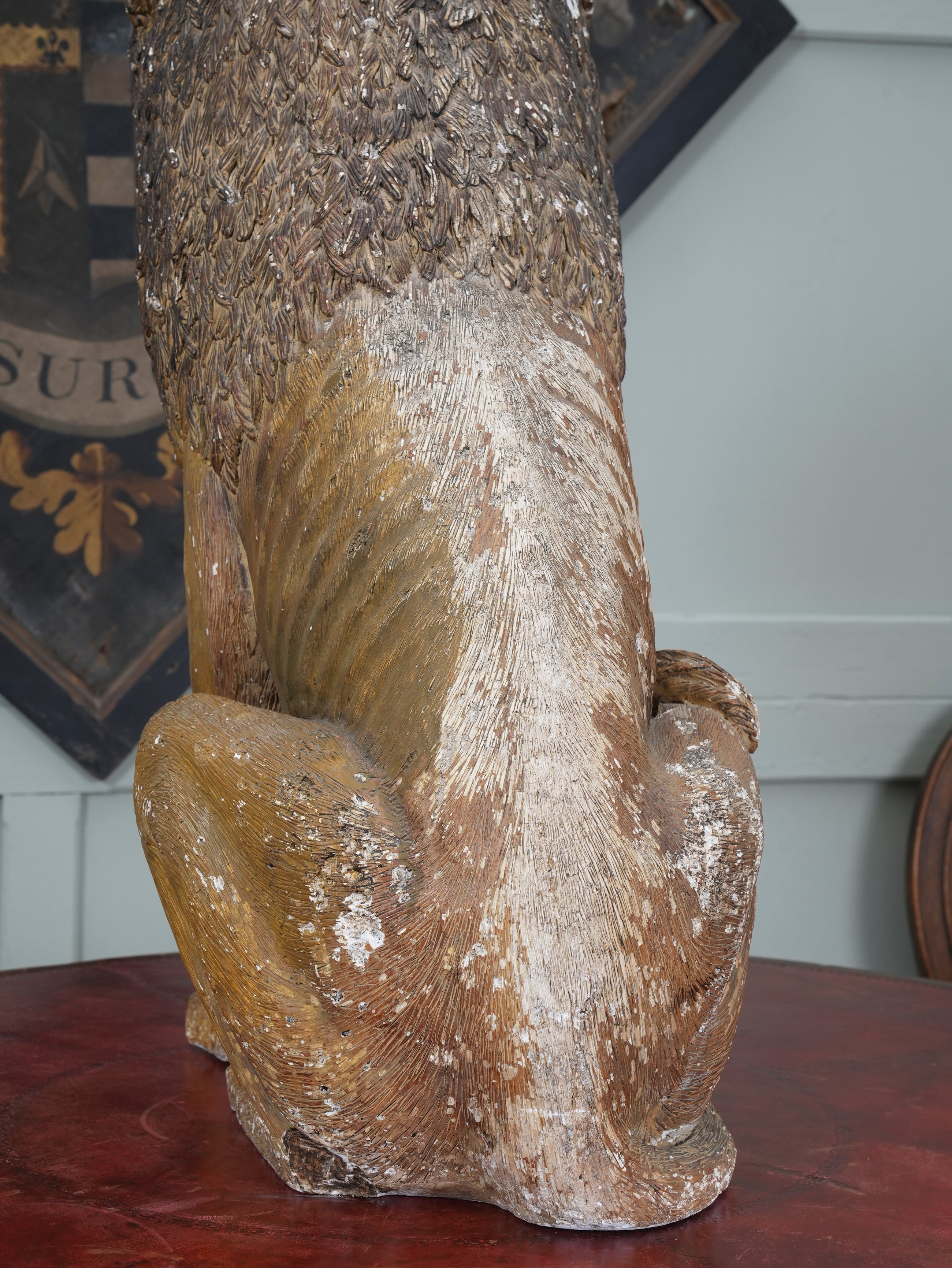 A Painted Plaster Seated Lion