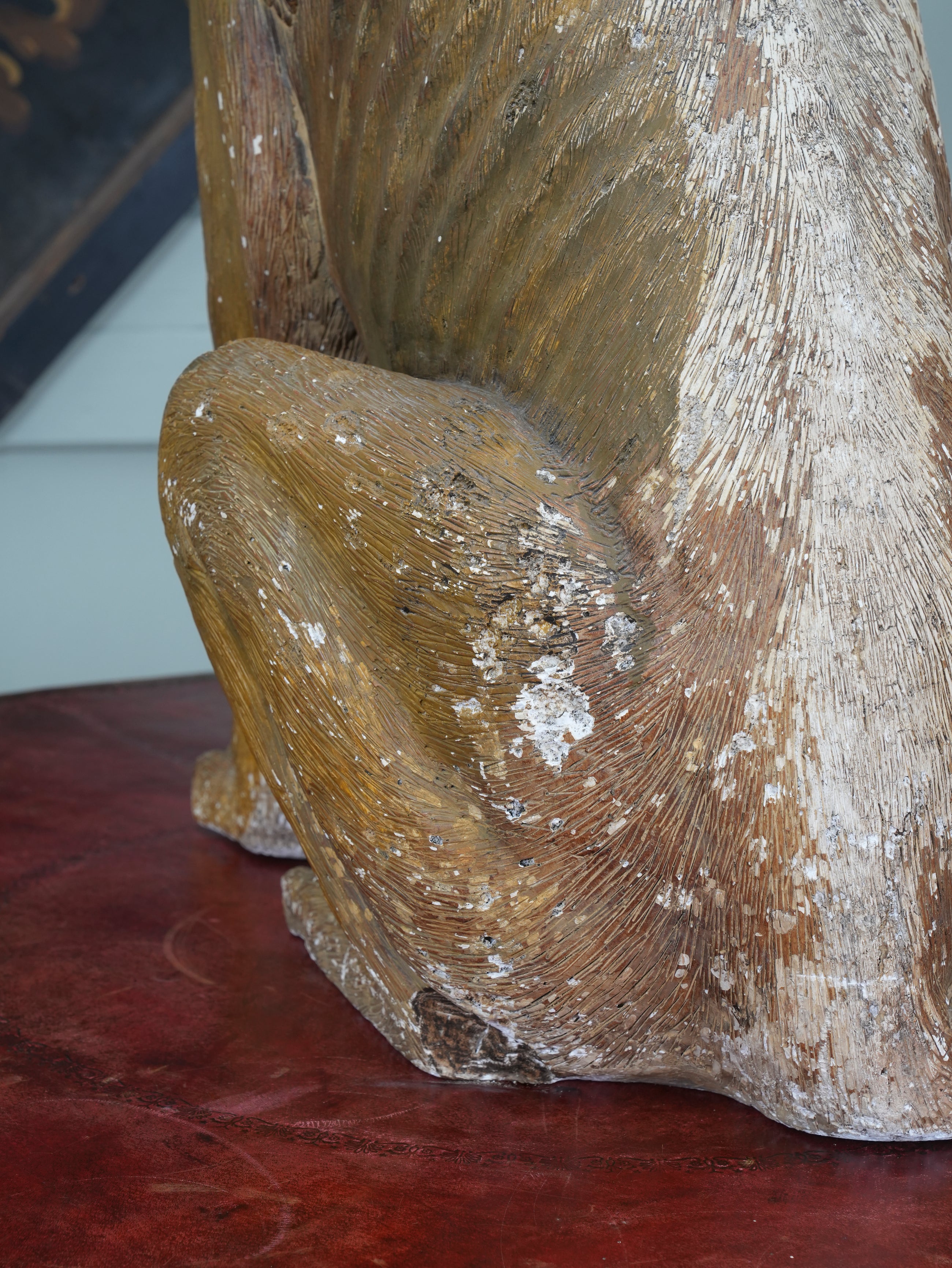 A Painted Plaster Seated Lion