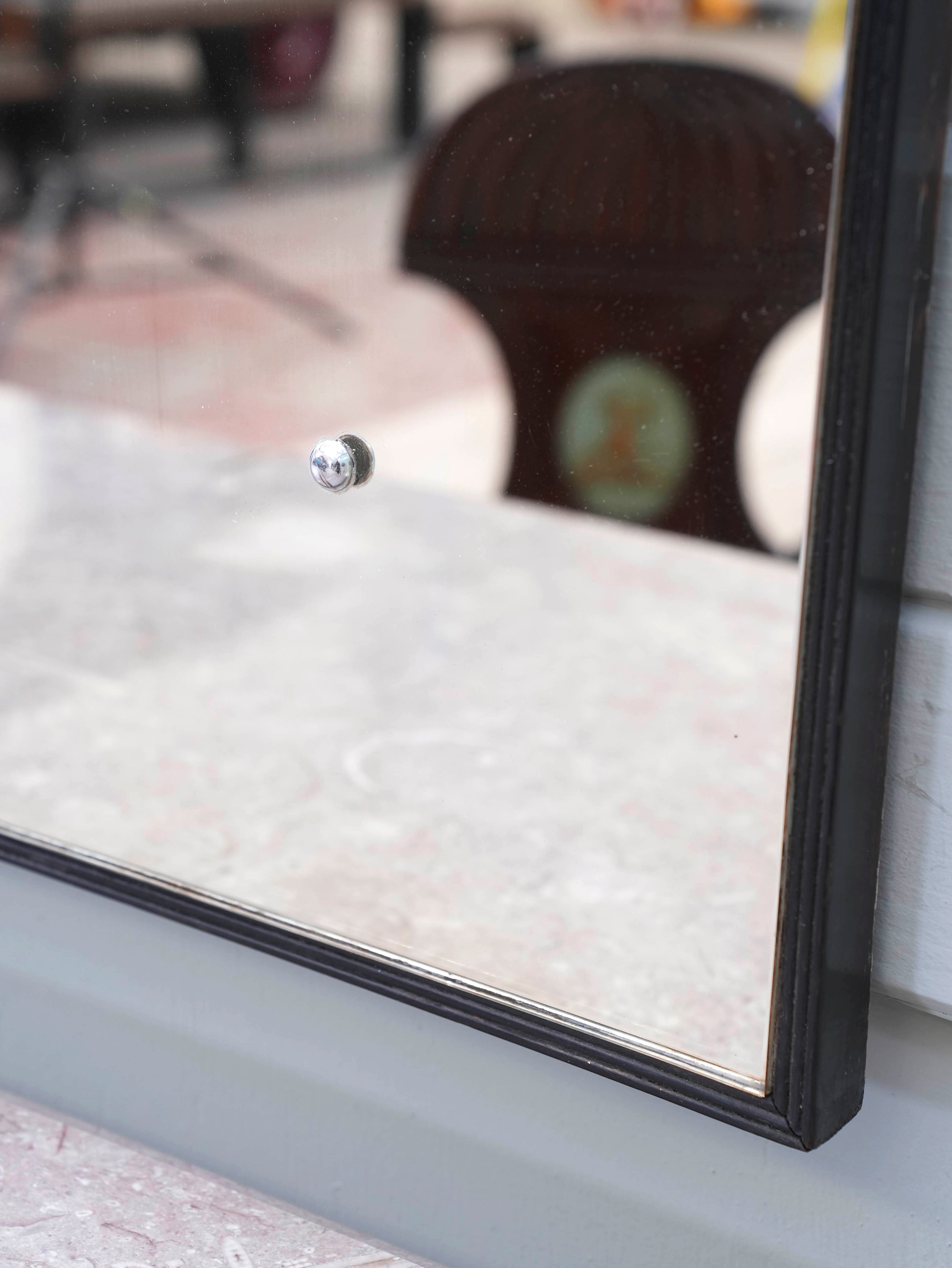 A Domed Top Mirror in a Reeded Timber frame