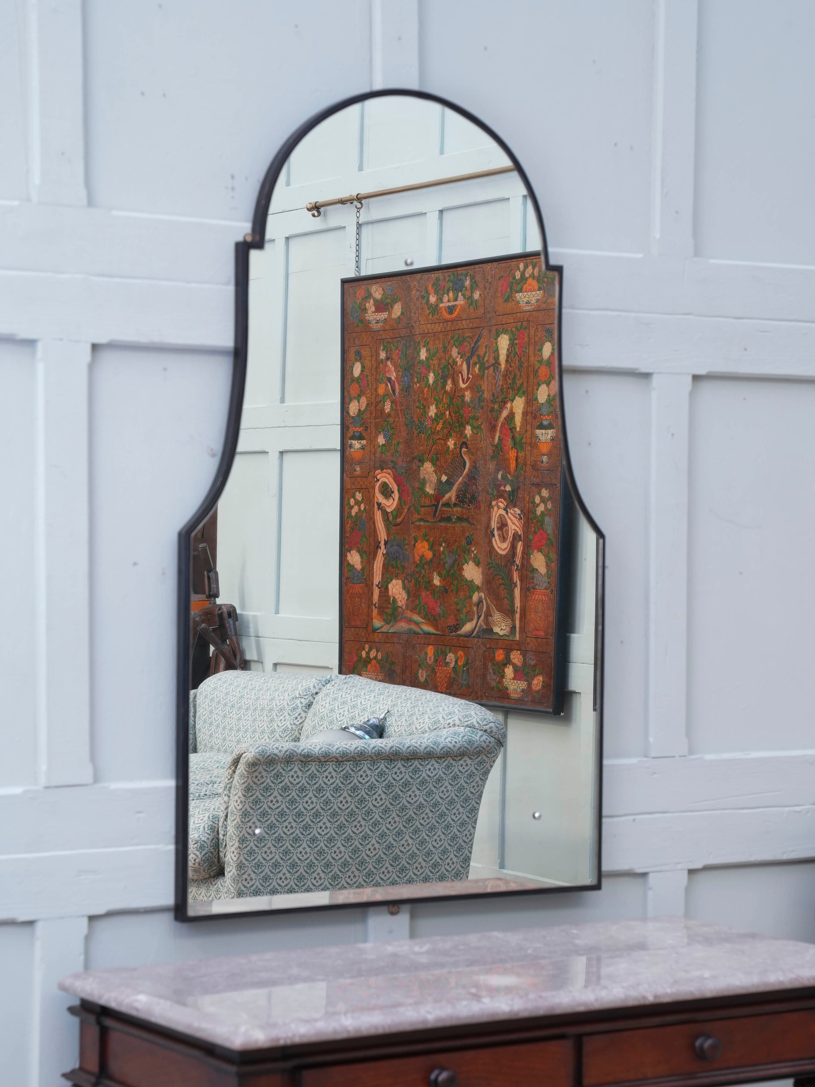 A Domed Top Mirror in a Reeded Timber frame
