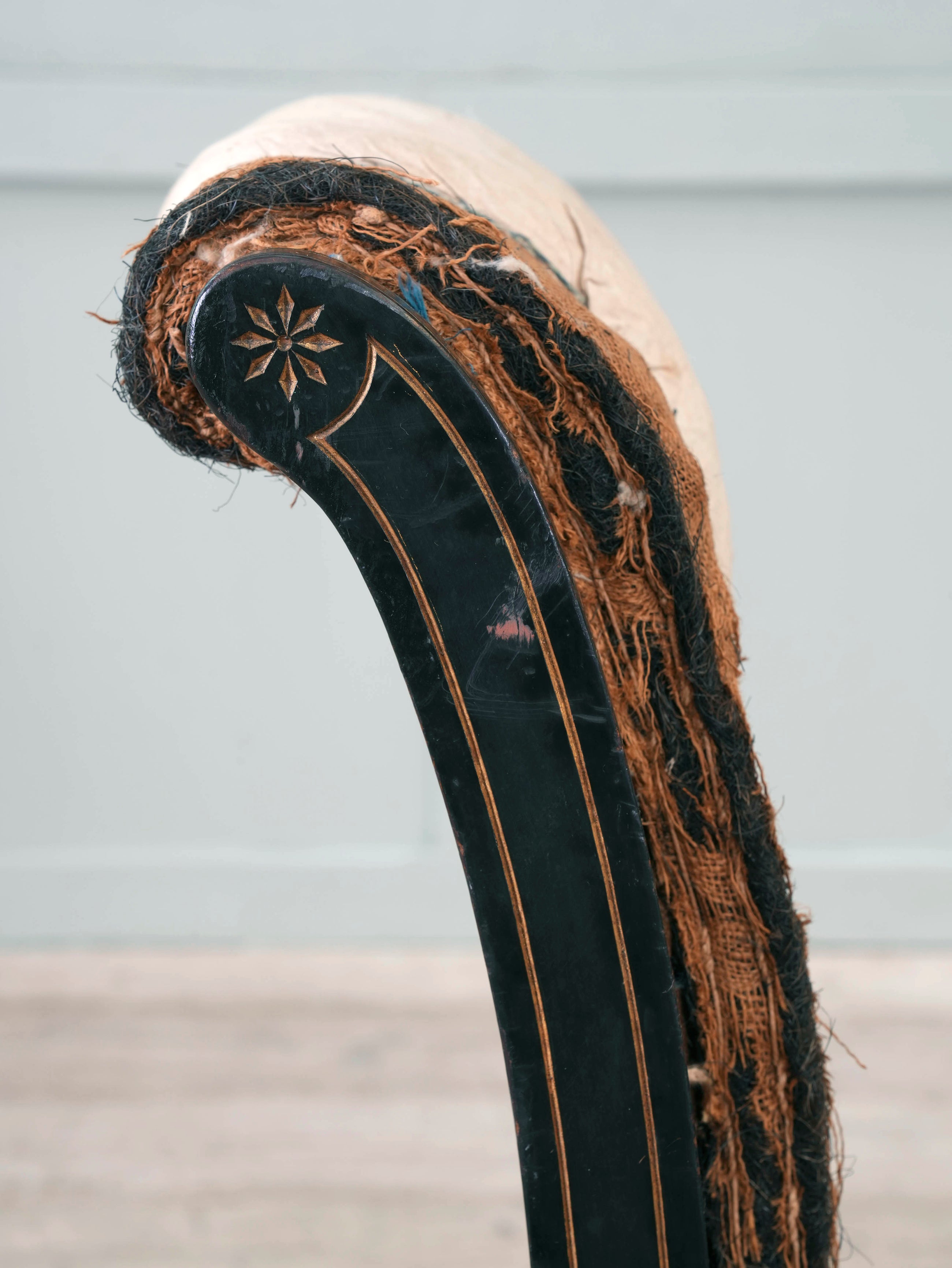 An Ebonised Aesthetic Movement Upholstered Chair