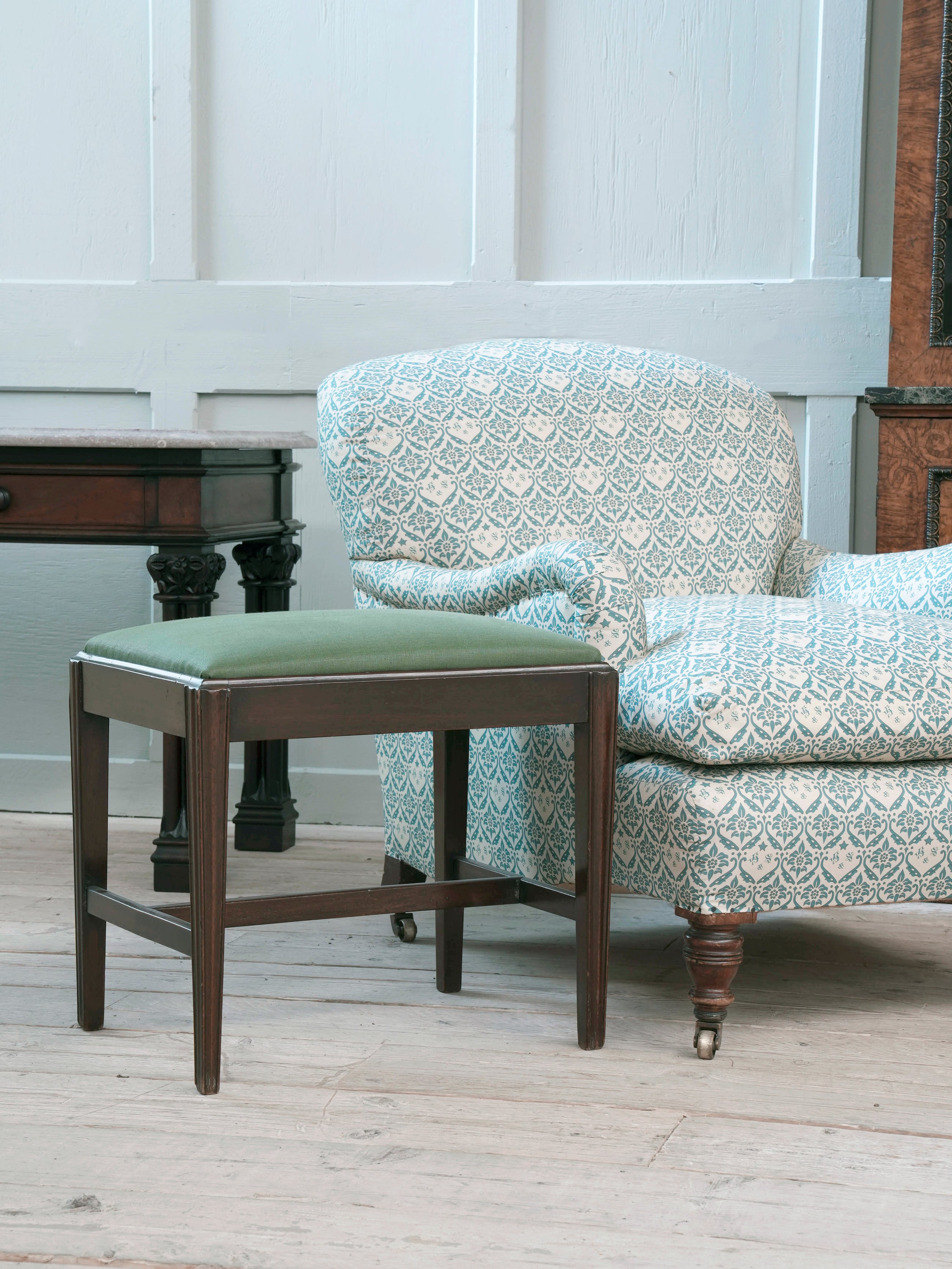 Two George III Upholstered Mahogany Stools