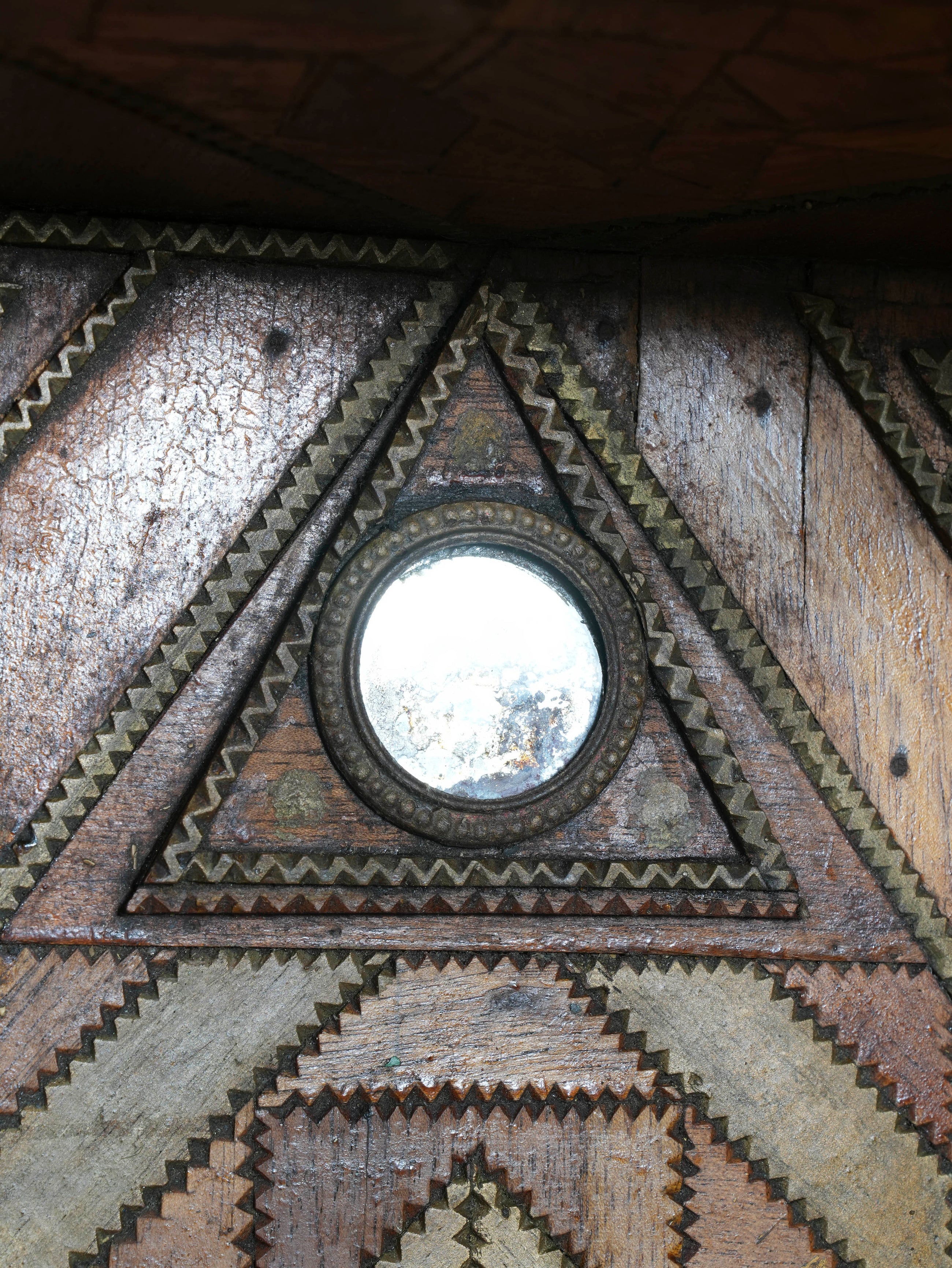 A Glazed Tramp Art Cabinet