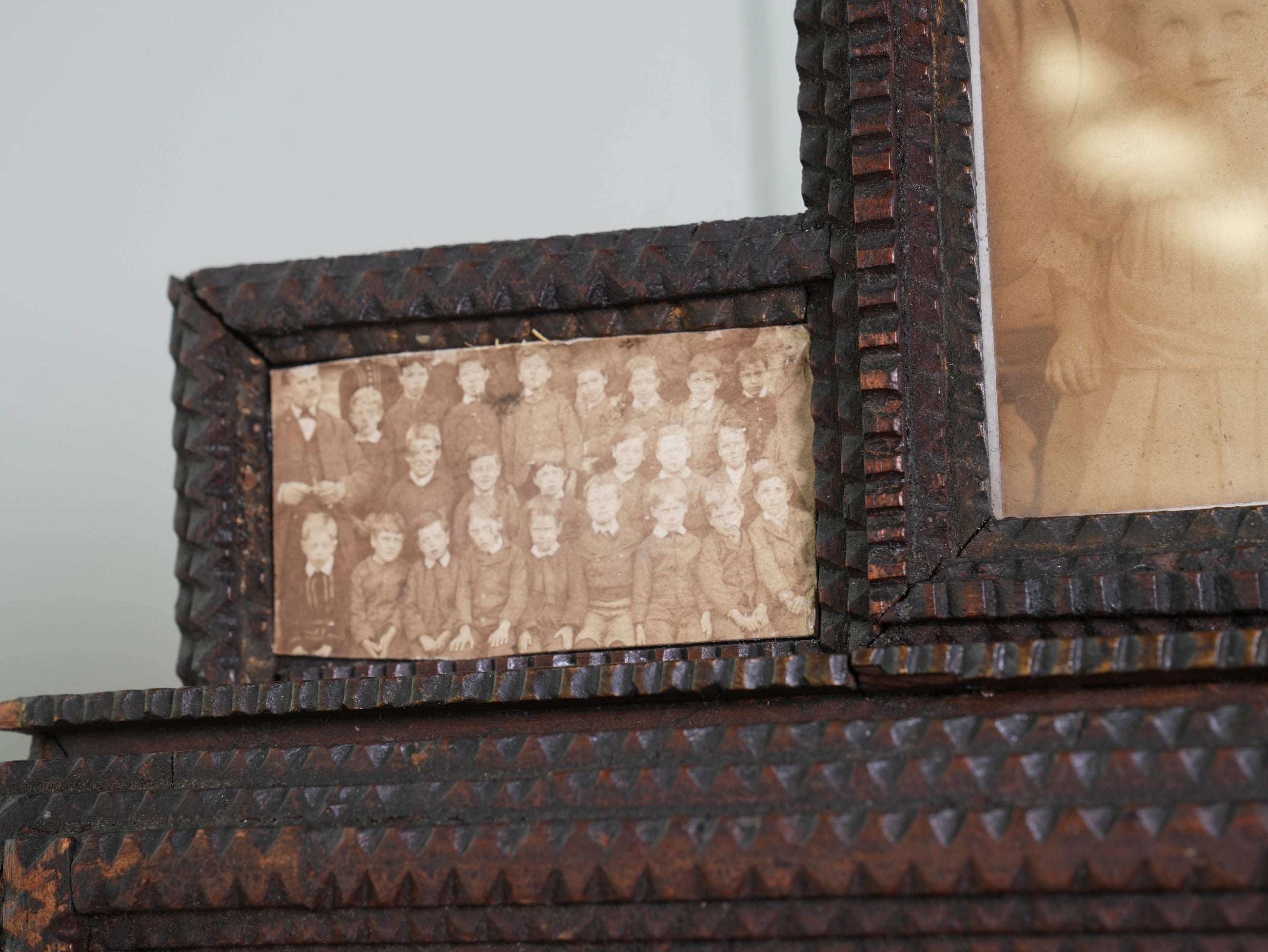 A Glazed Tramp Art Cabinet