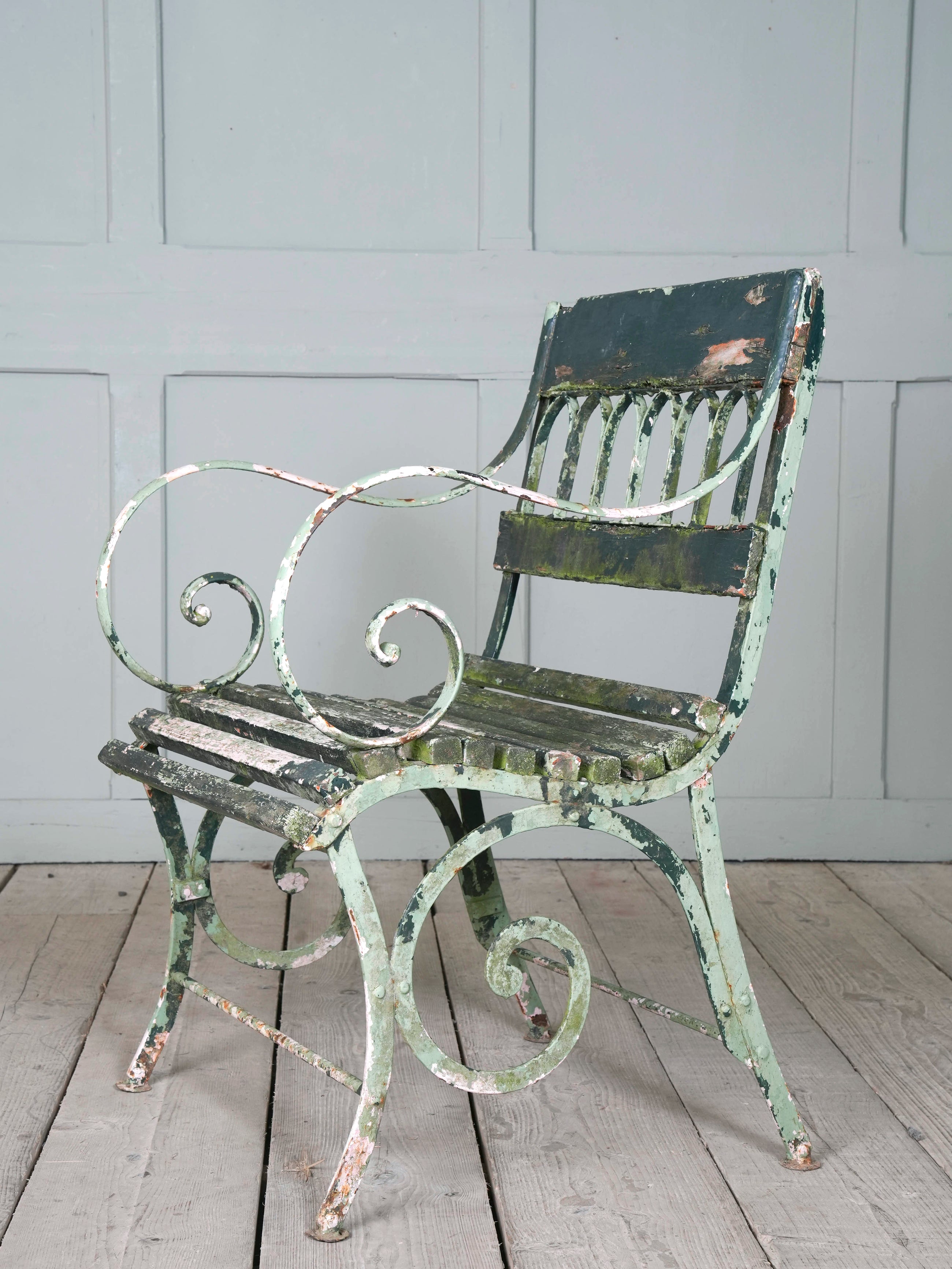 Two Wrought Iron Garden Chairs