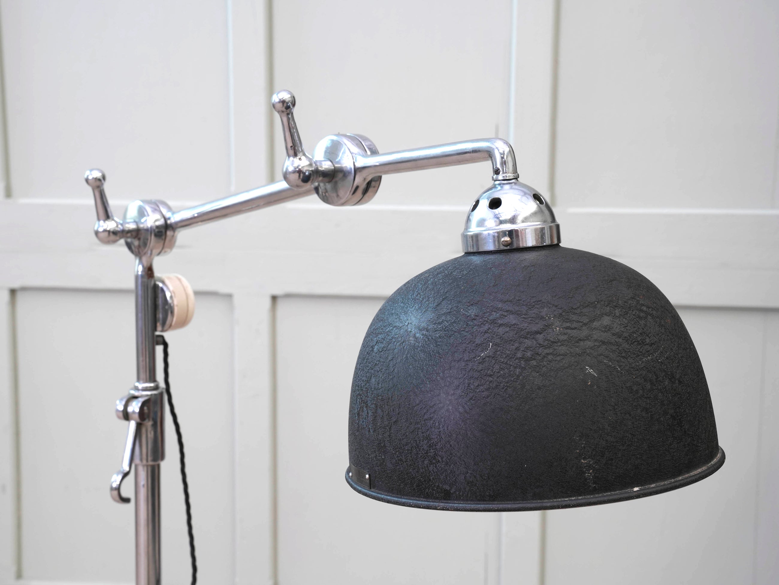 An Adjustable Nickel Plated Floor Lamp