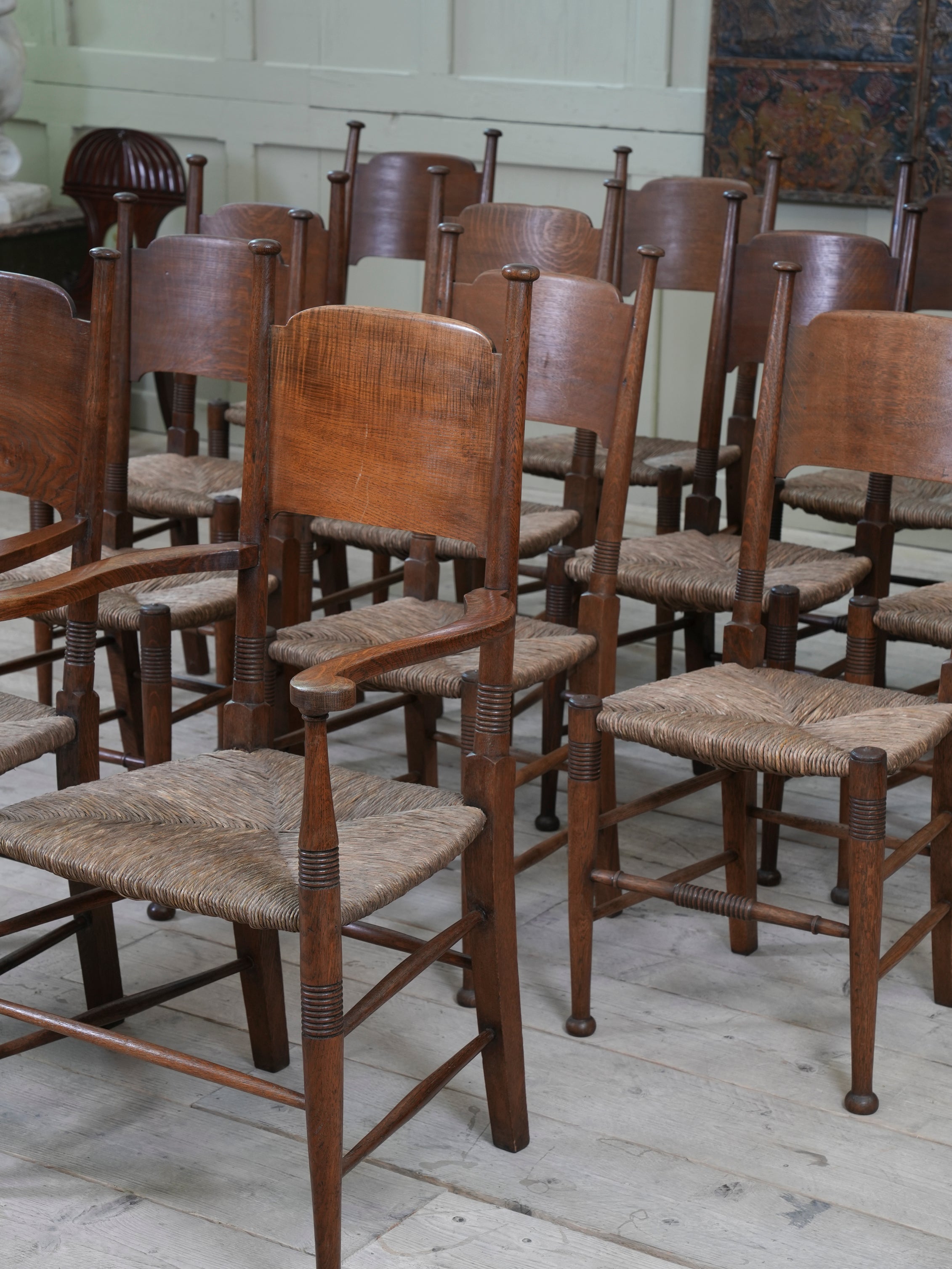 A Harlequin Set of fourteen William Birch Dining Chairs