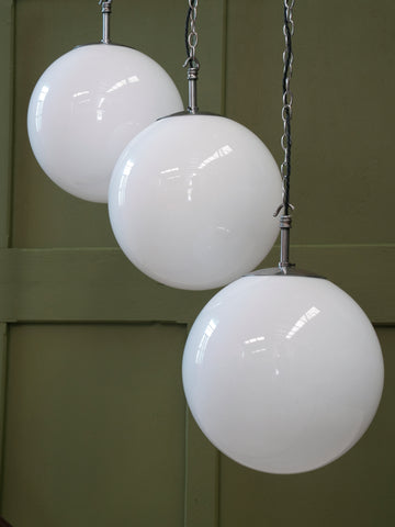 ‘Falks” Globe Opaline Pendant Lights