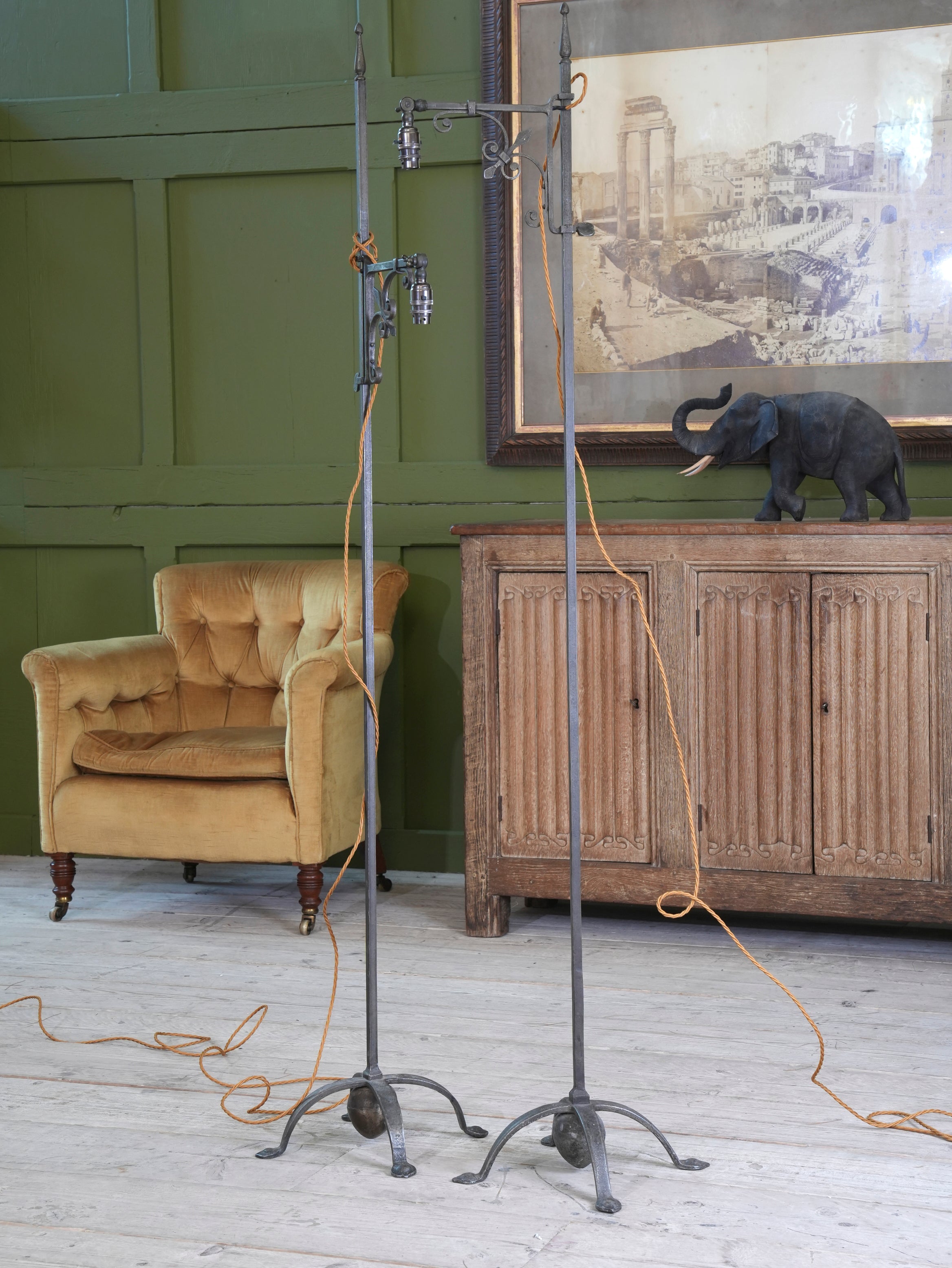A Pair of Wrought Iron Floor Lamps