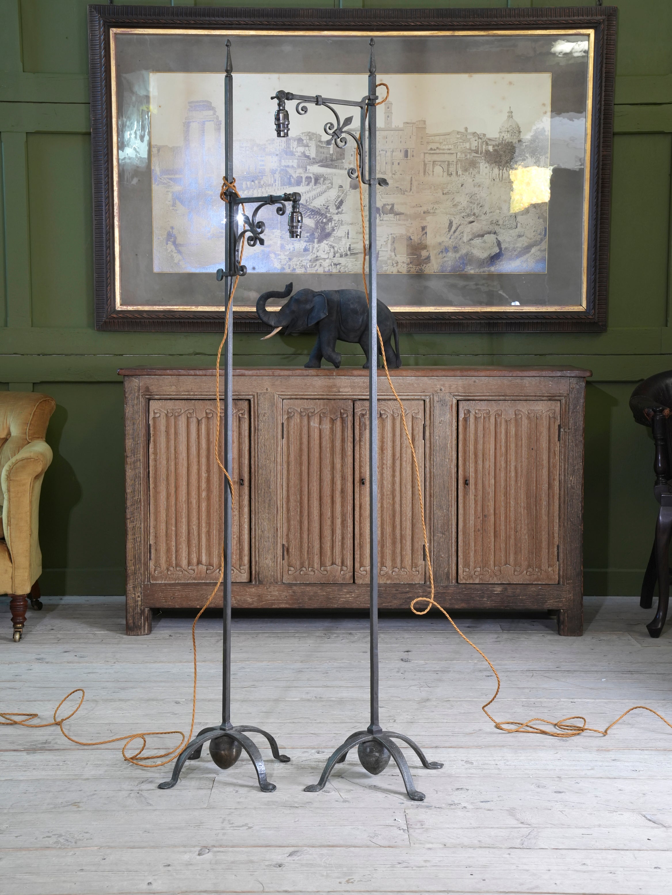 A Pair of Wrought Iron Floor Lamps