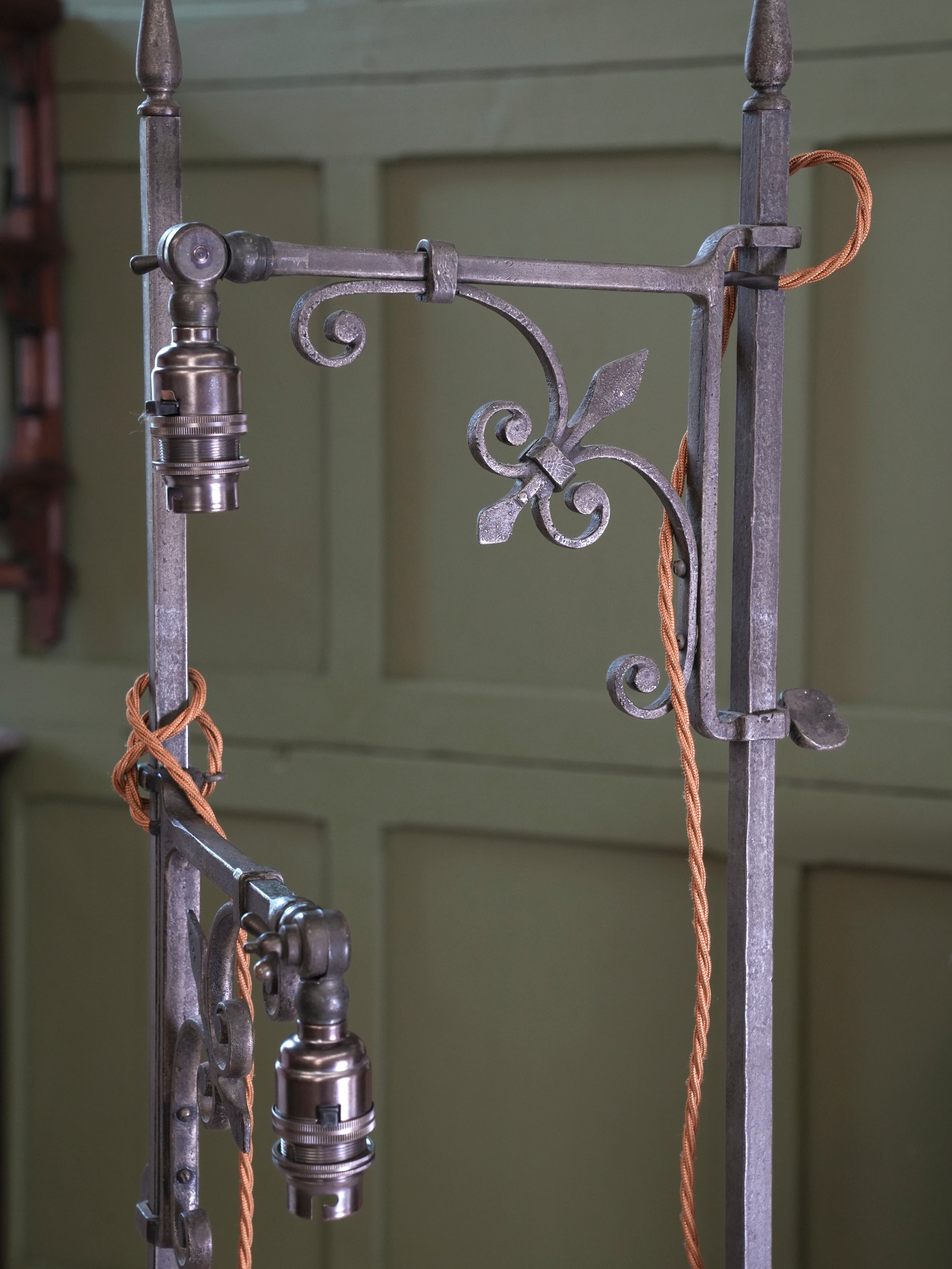 A Pair of Wrought Iron Floor Lamps