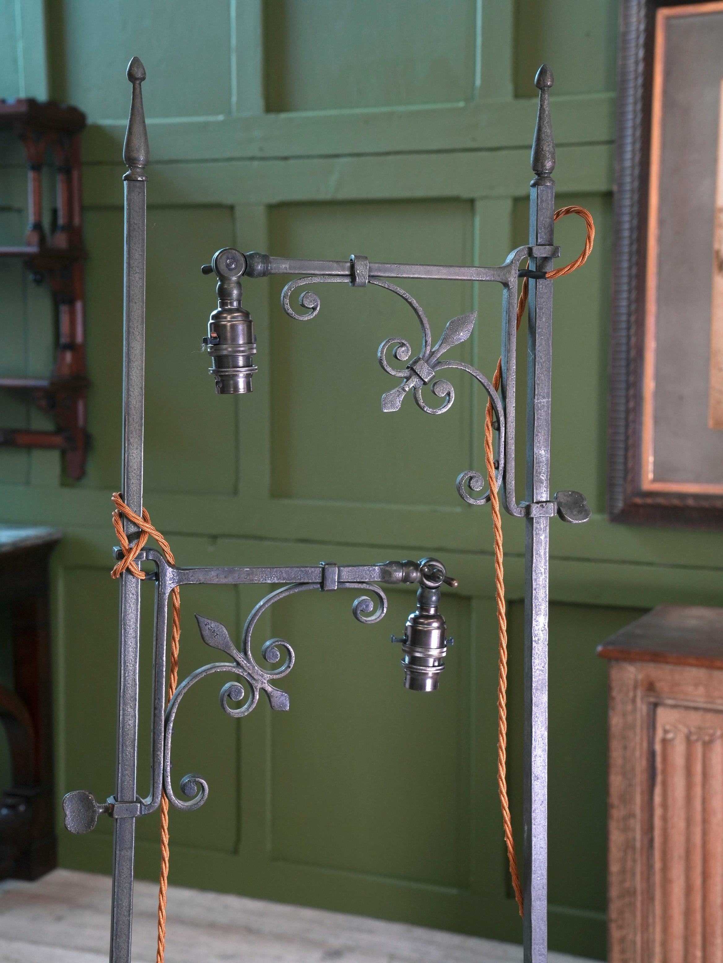 A Pair of Wrought Iron Floor Lamps