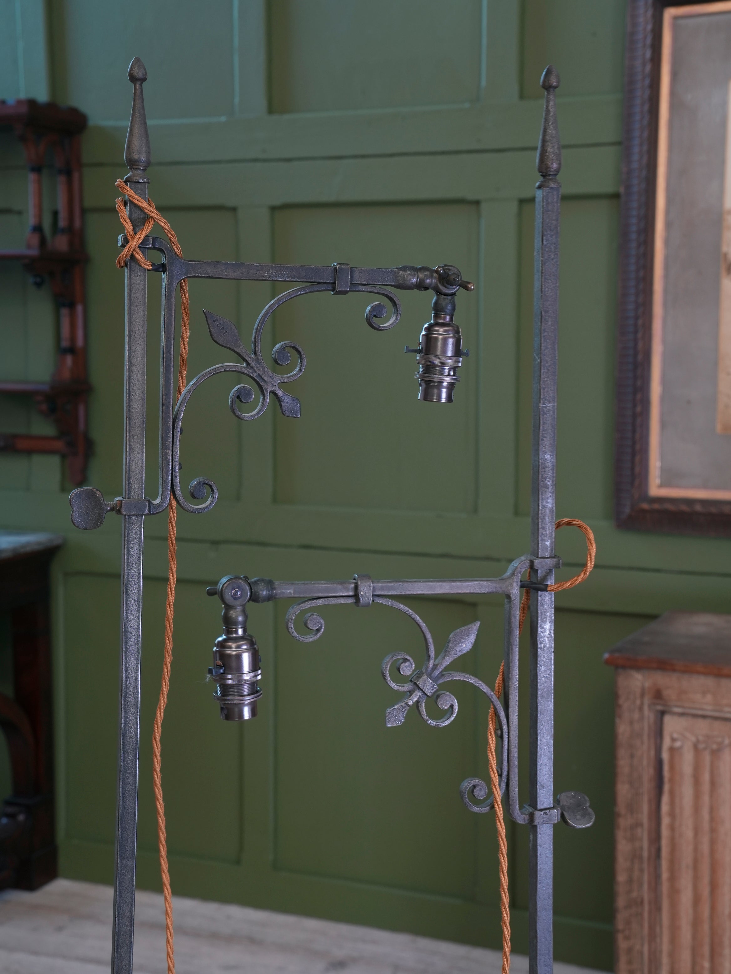 A Pair of Wrought Iron Floor Lamps