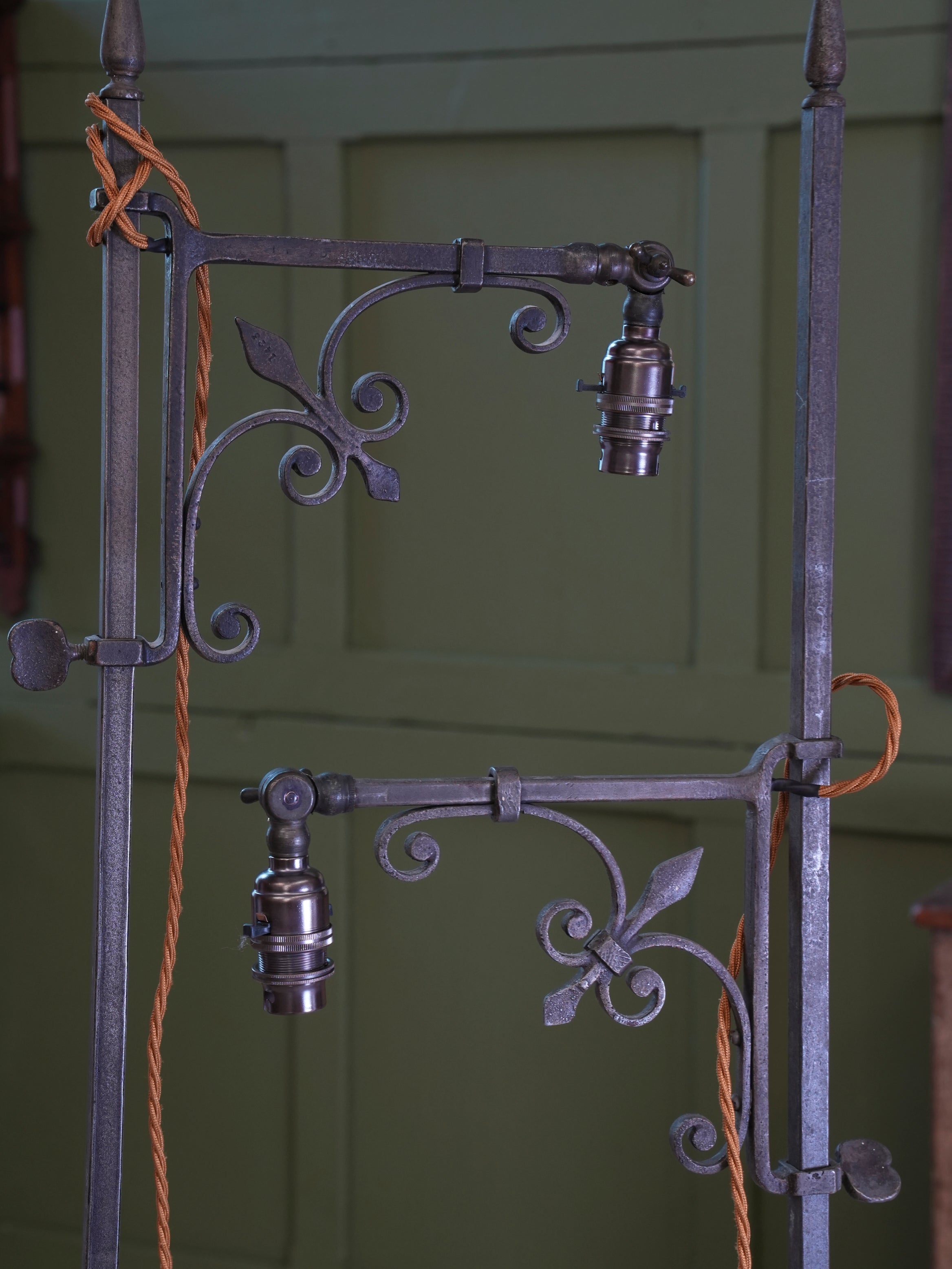A Pair of Wrought Iron Floor Lamps