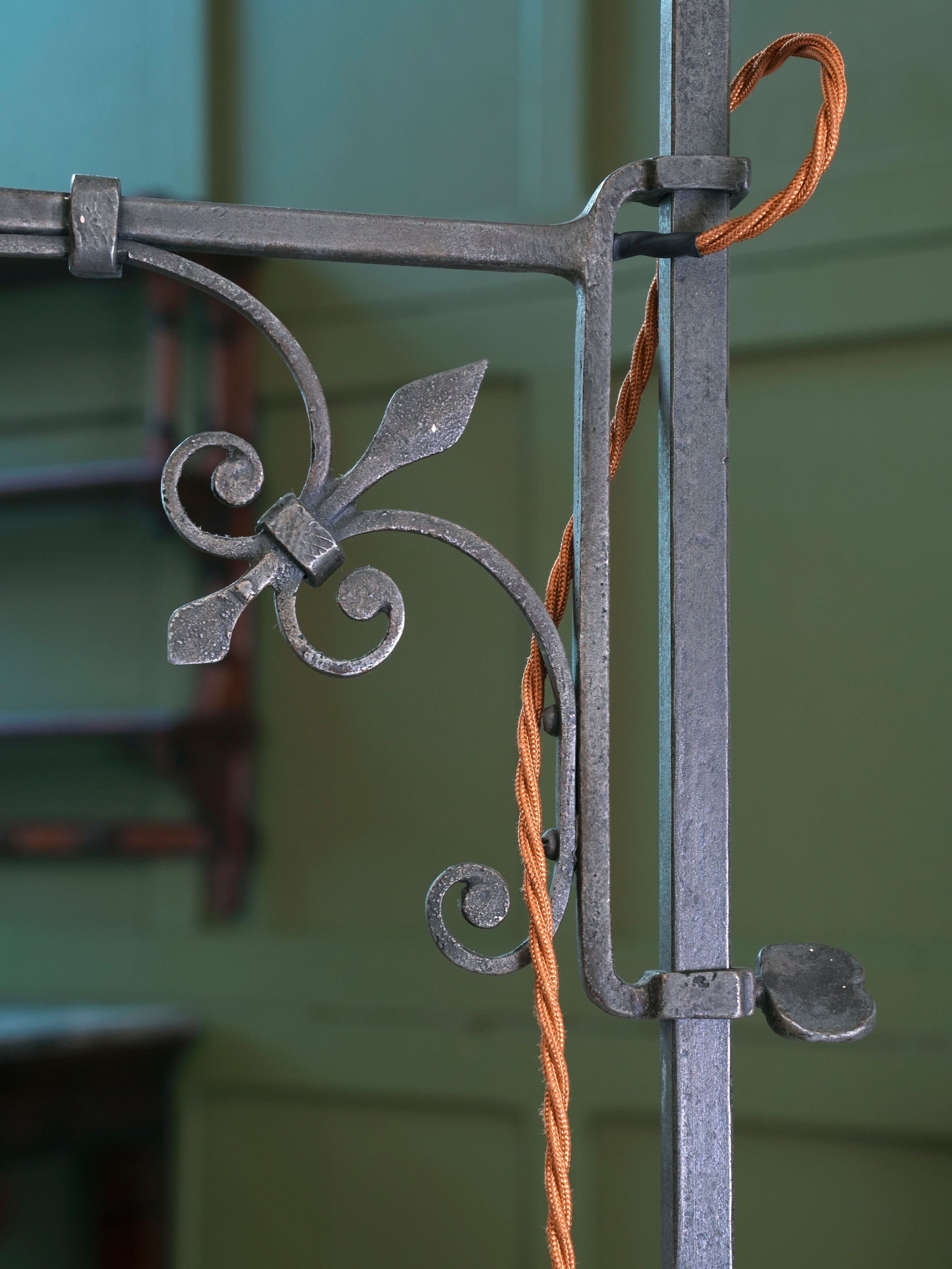 A Pair of Wrought Iron Floor Lamps