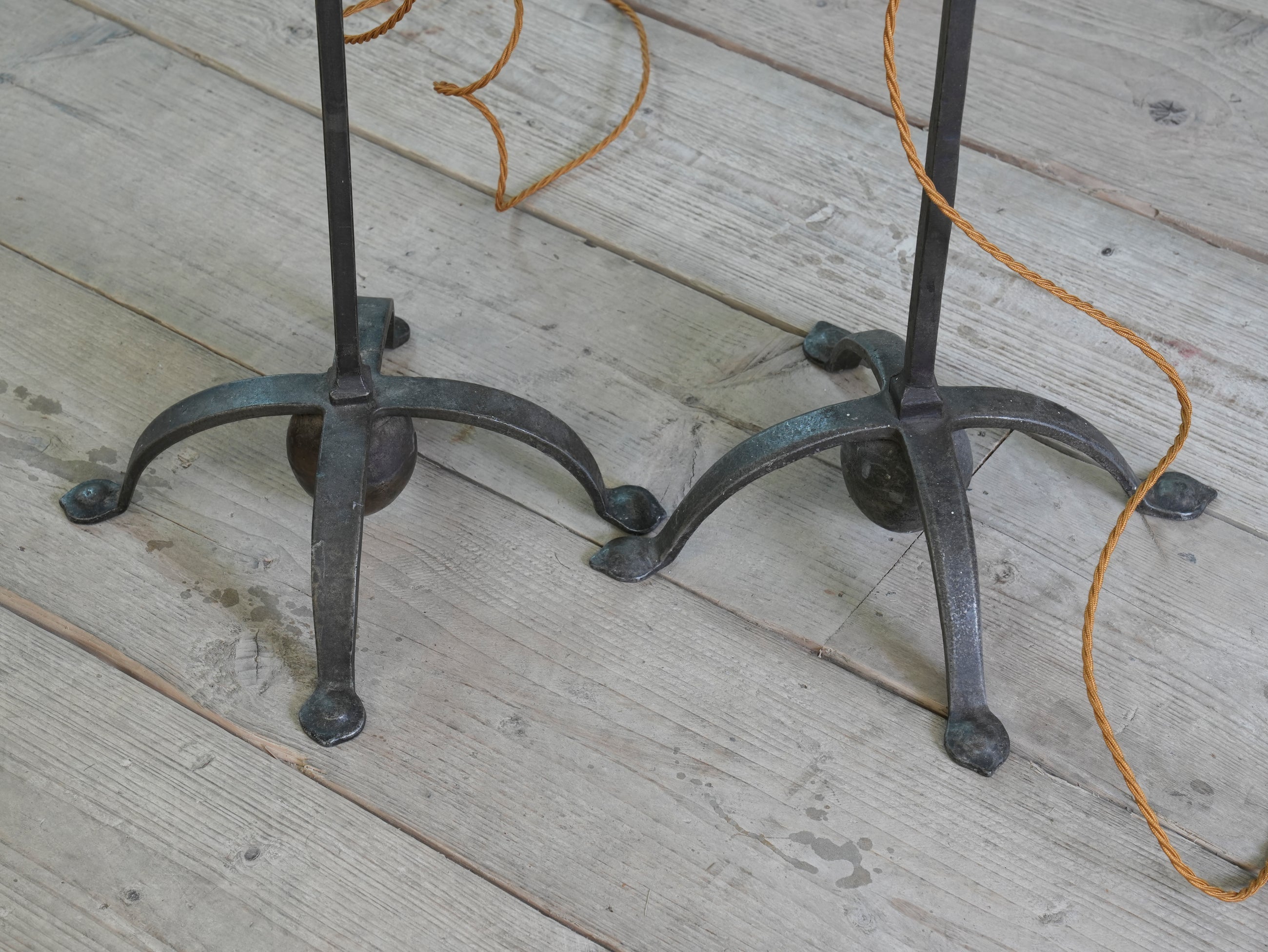 A Pair of Wrought Iron Floor Lamps