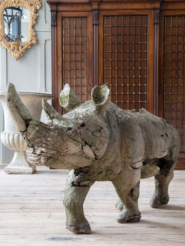 A Carved Hardwood Rhino Sculpture