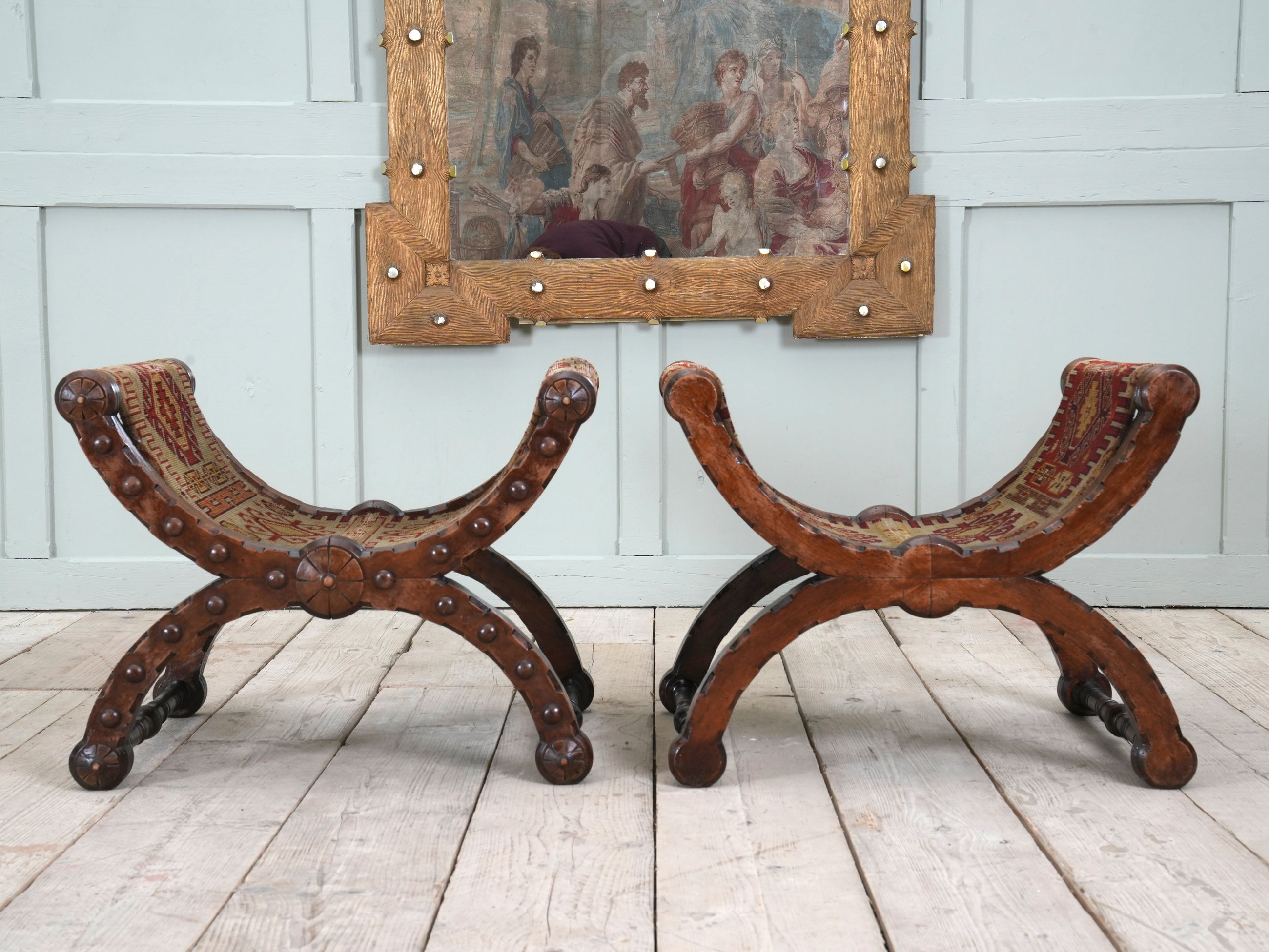 A Pair of Reformed Gothic X Frame Mahogany Stools