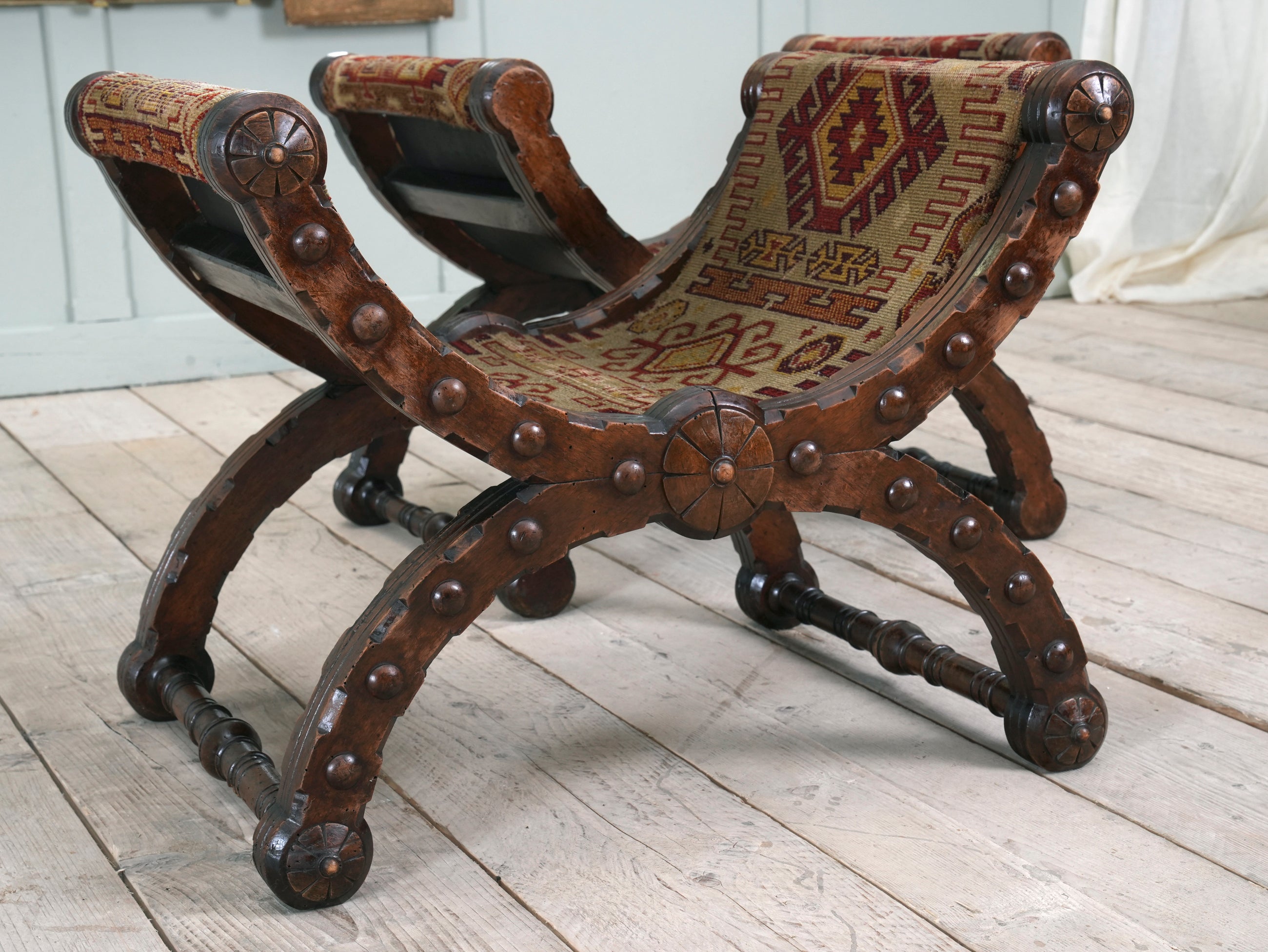 A Pair of Reformed Gothic X Frame Mahogany Stools