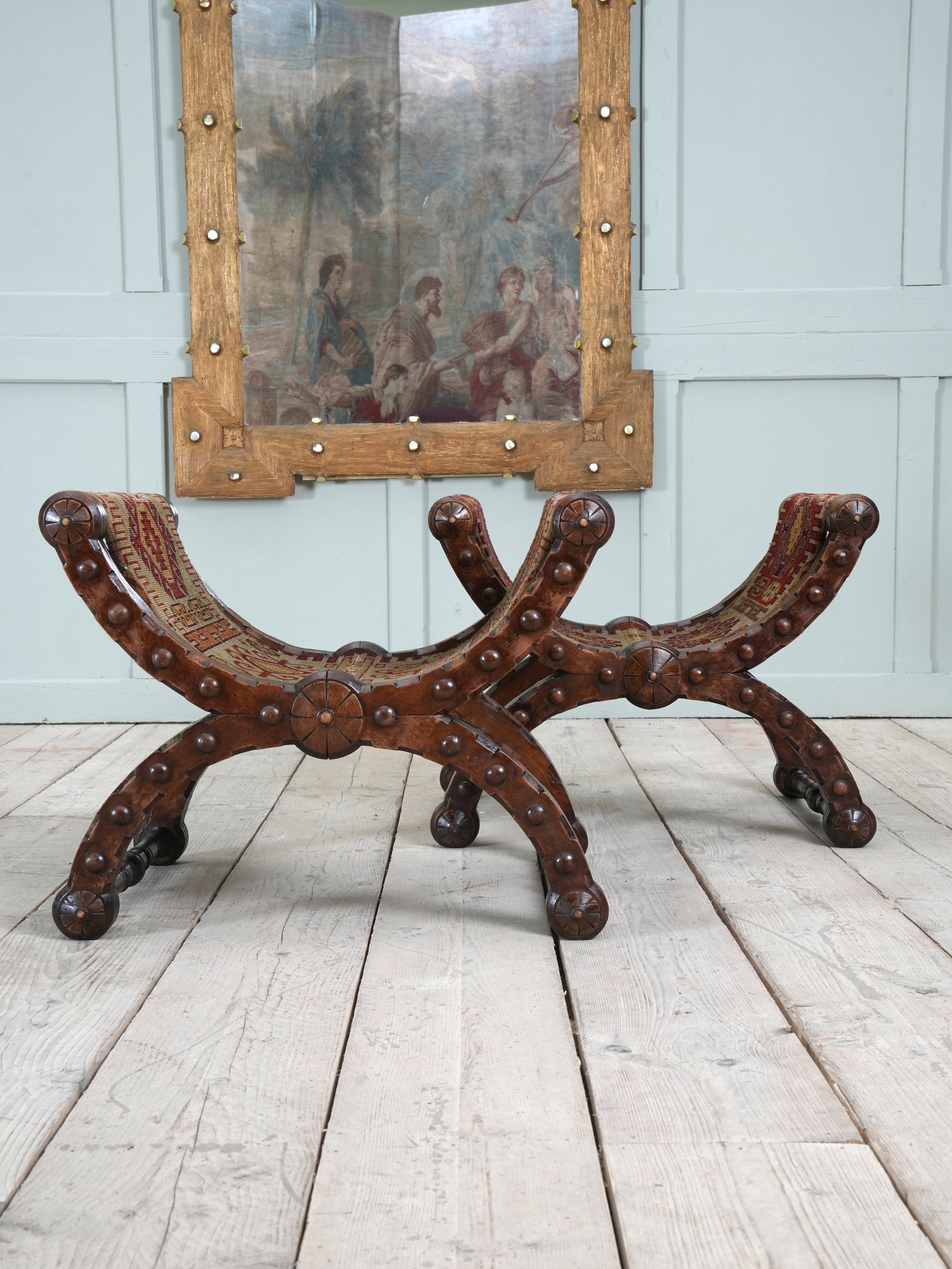 A Pair of Reformed Gothic X Frame Mahogany Stools