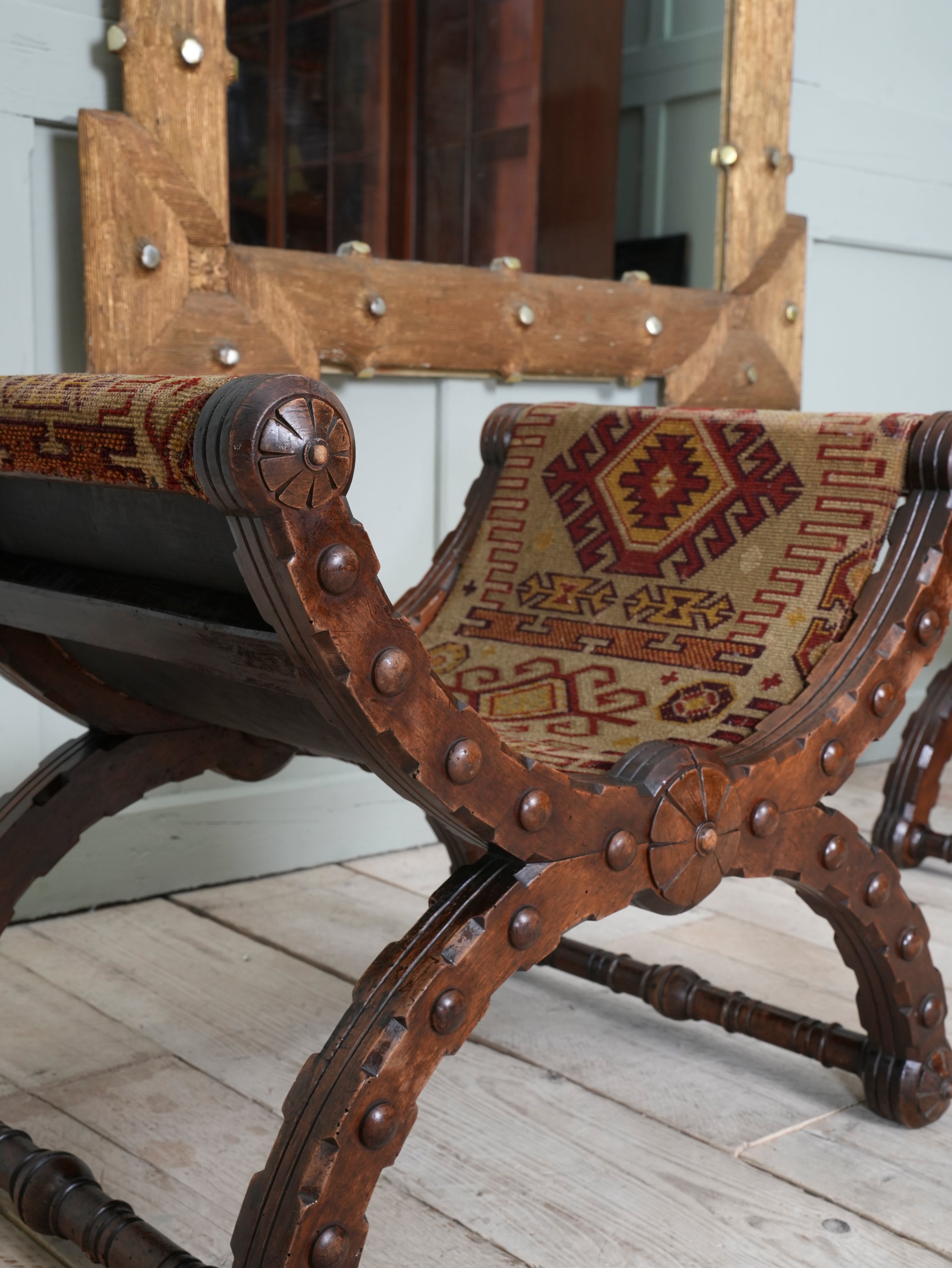 A Pair of Reformed Gothic X Frame Mahogany Stools