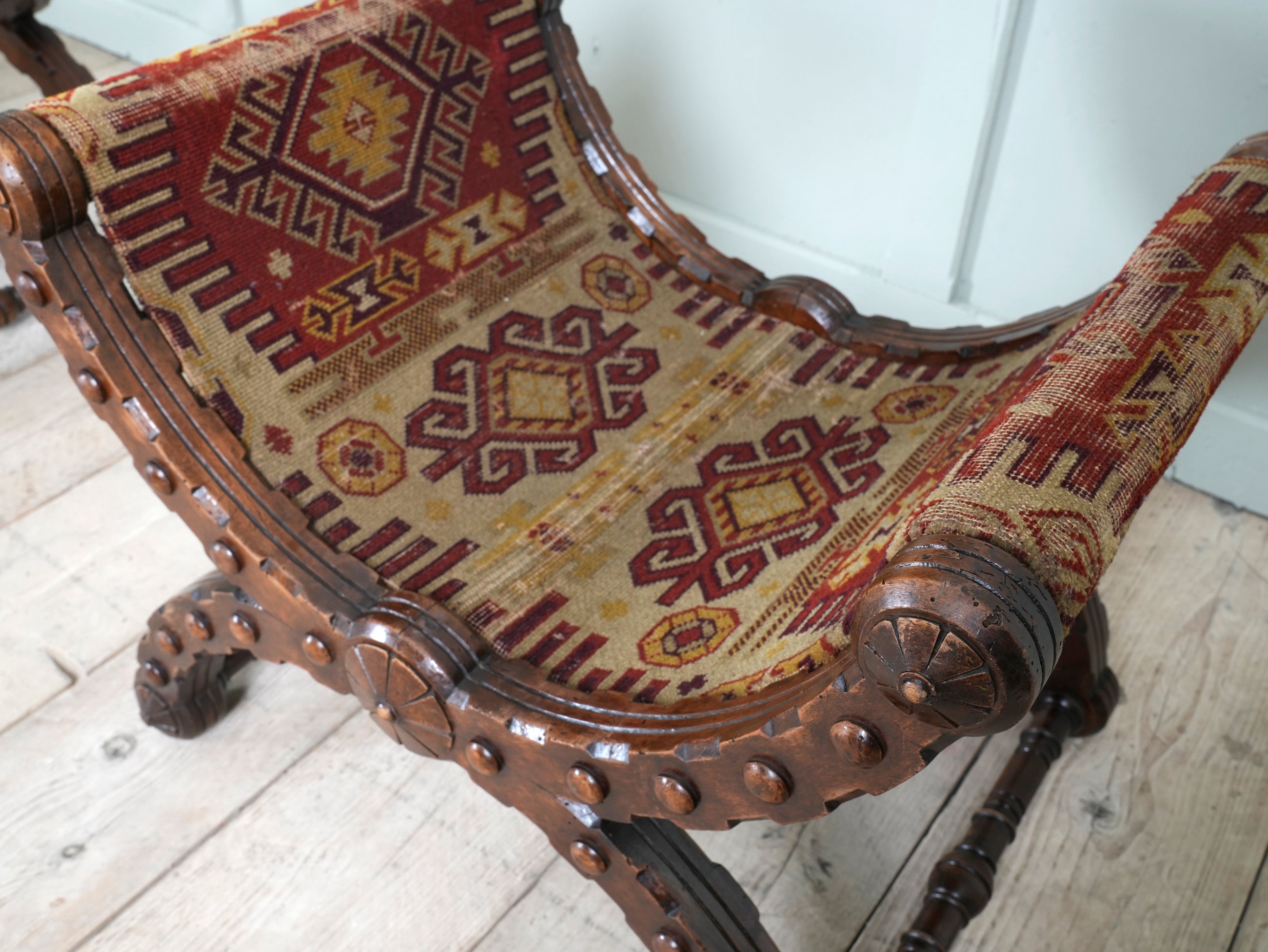 A Pair of Reformed Gothic X Frame Mahogany Stools