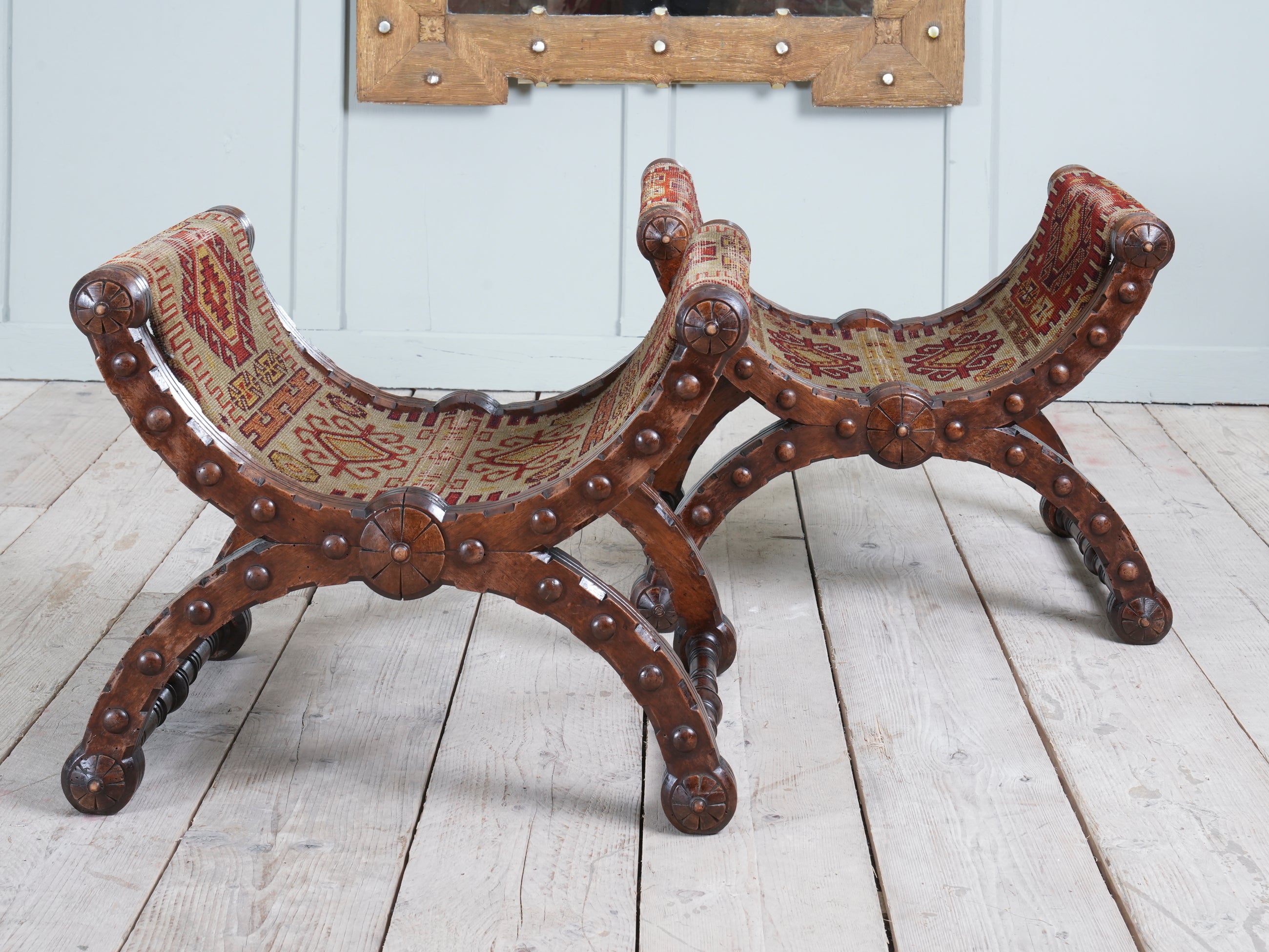 A Pair of Reformed Gothic X Frame Mahogany Stools