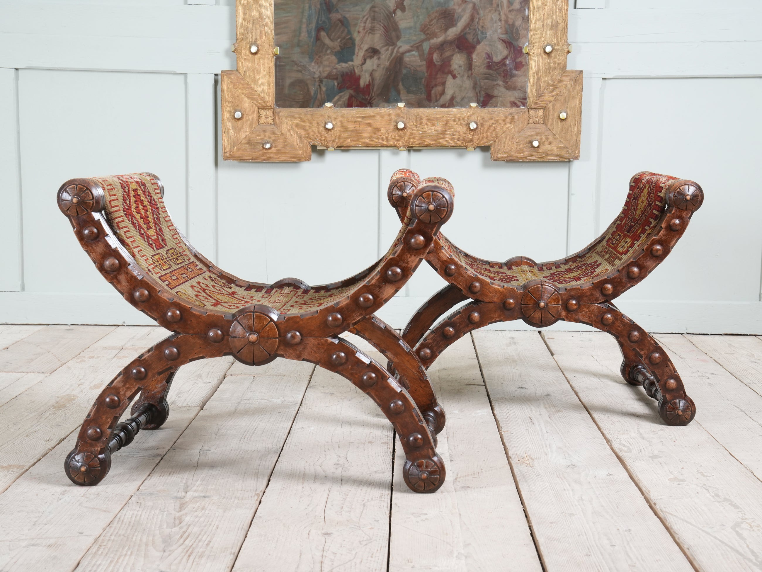 A Pair of Reformed Gothic X Frame Mahogany Stools