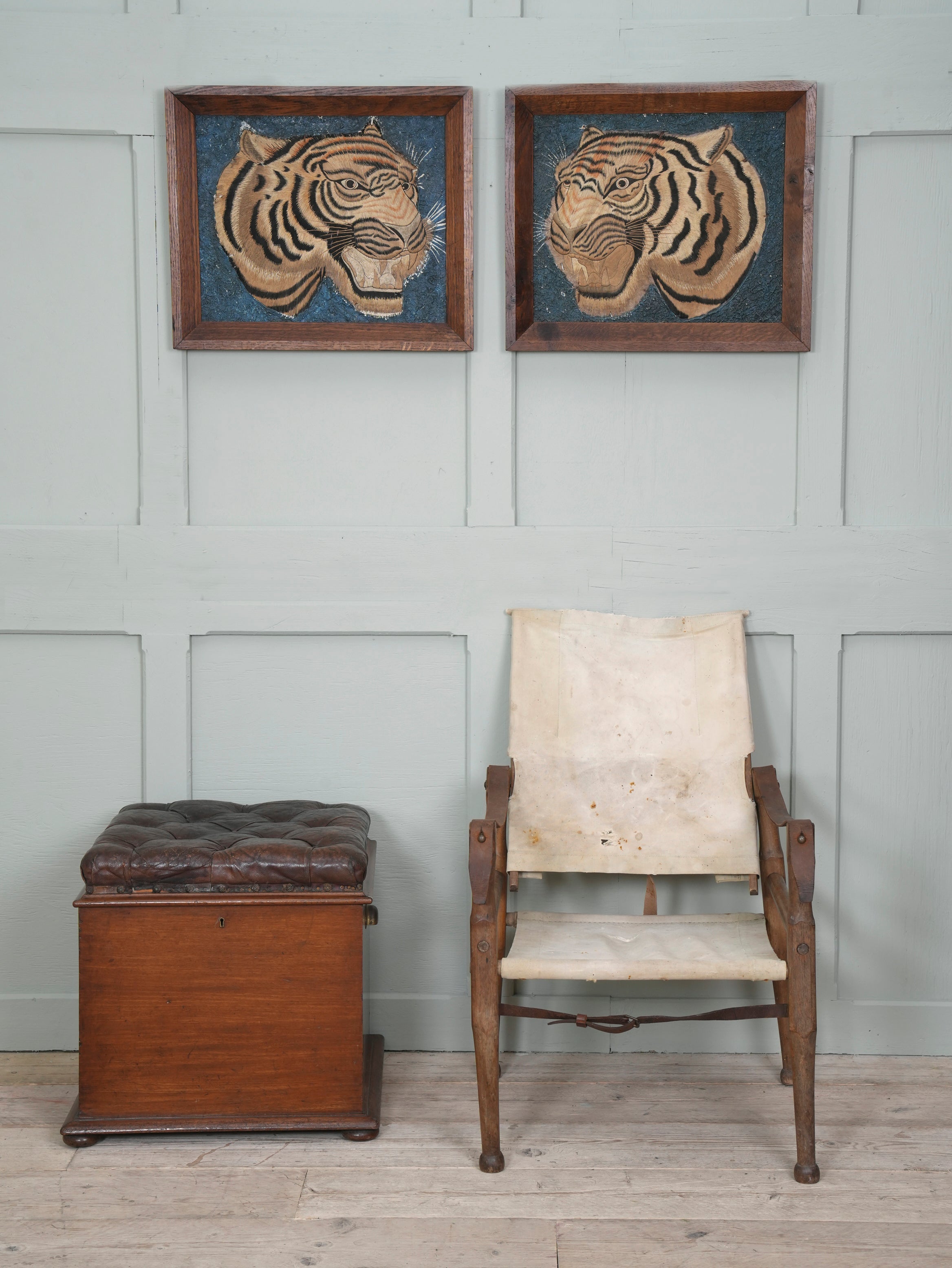 A Pair of Framed Silk Embroideries of Tigers Heads