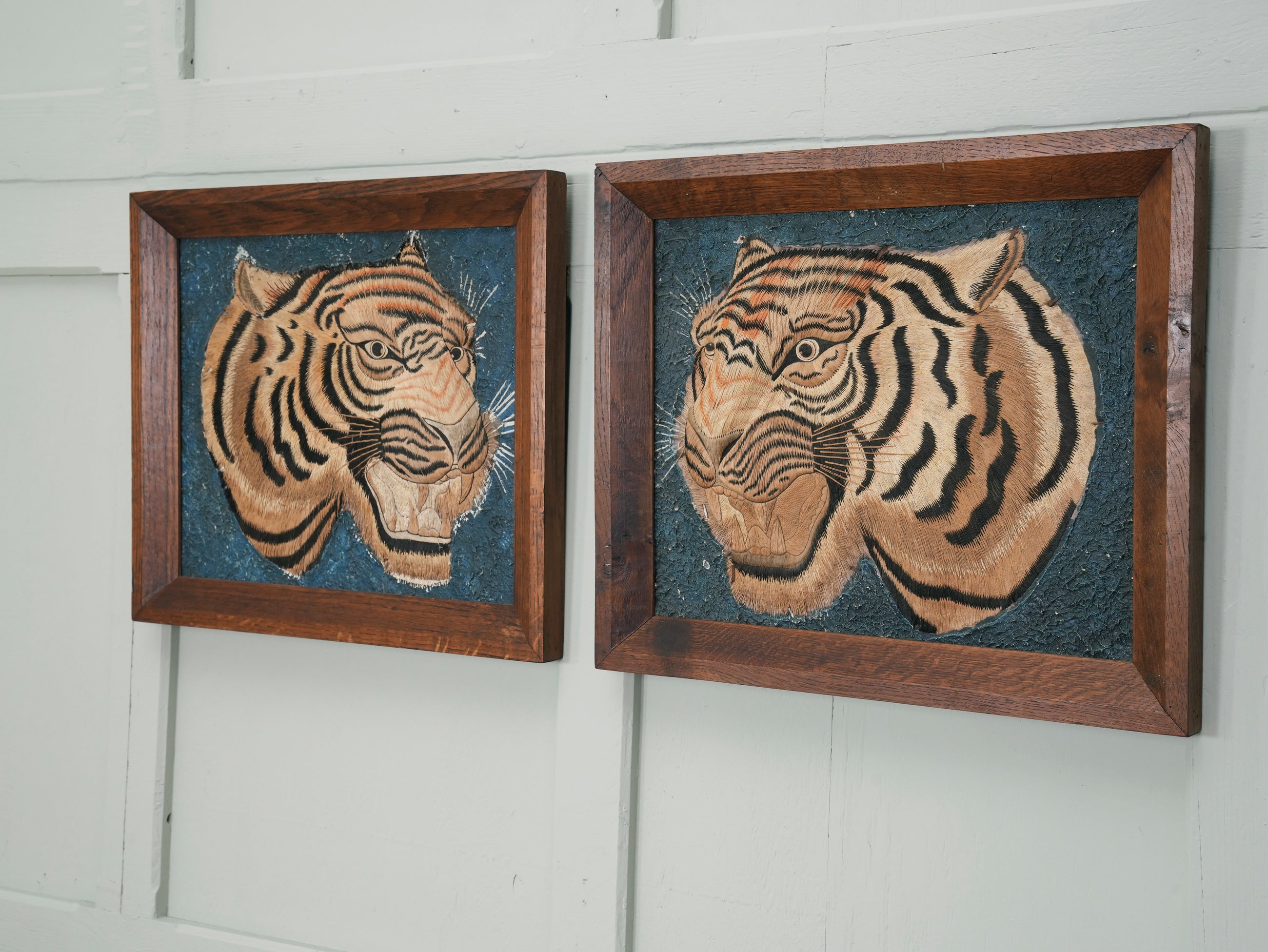 A Pair of Framed Silk Embroideries of Tigers Heads