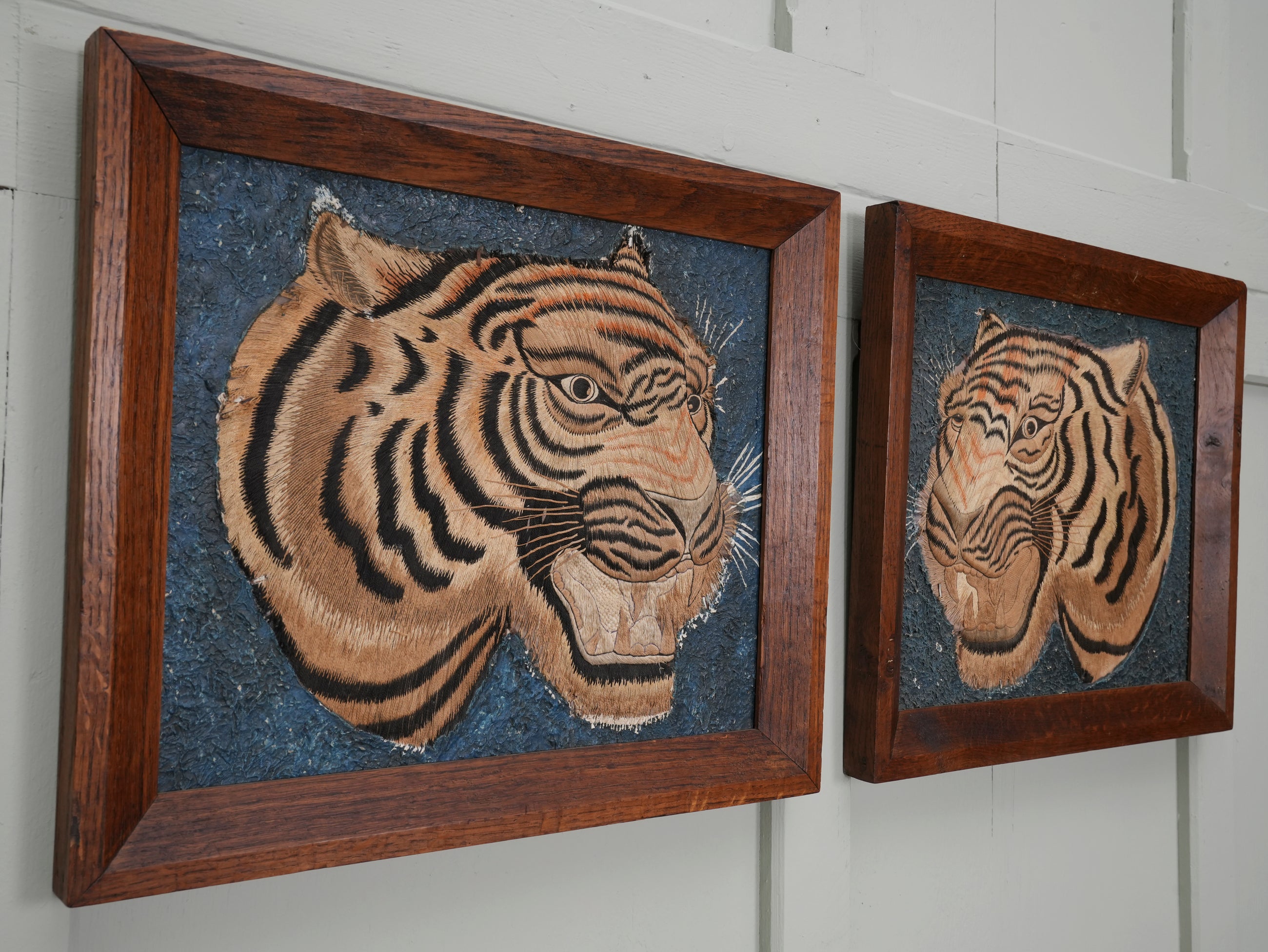 A Pair of Framed Silk Embroideries of Tigers Heads