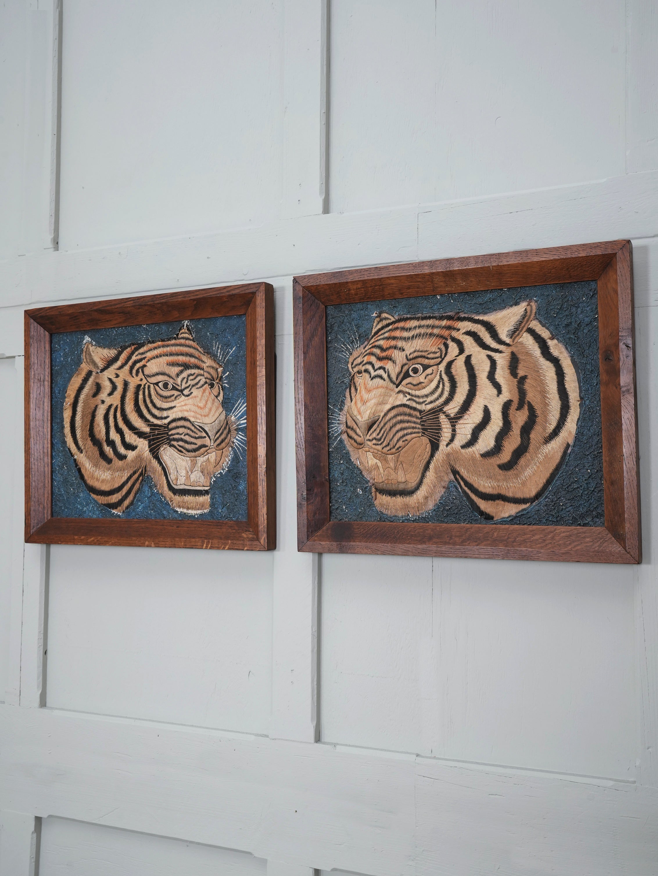 A Pair of Framed Silk Embroideries of Tigers Heads