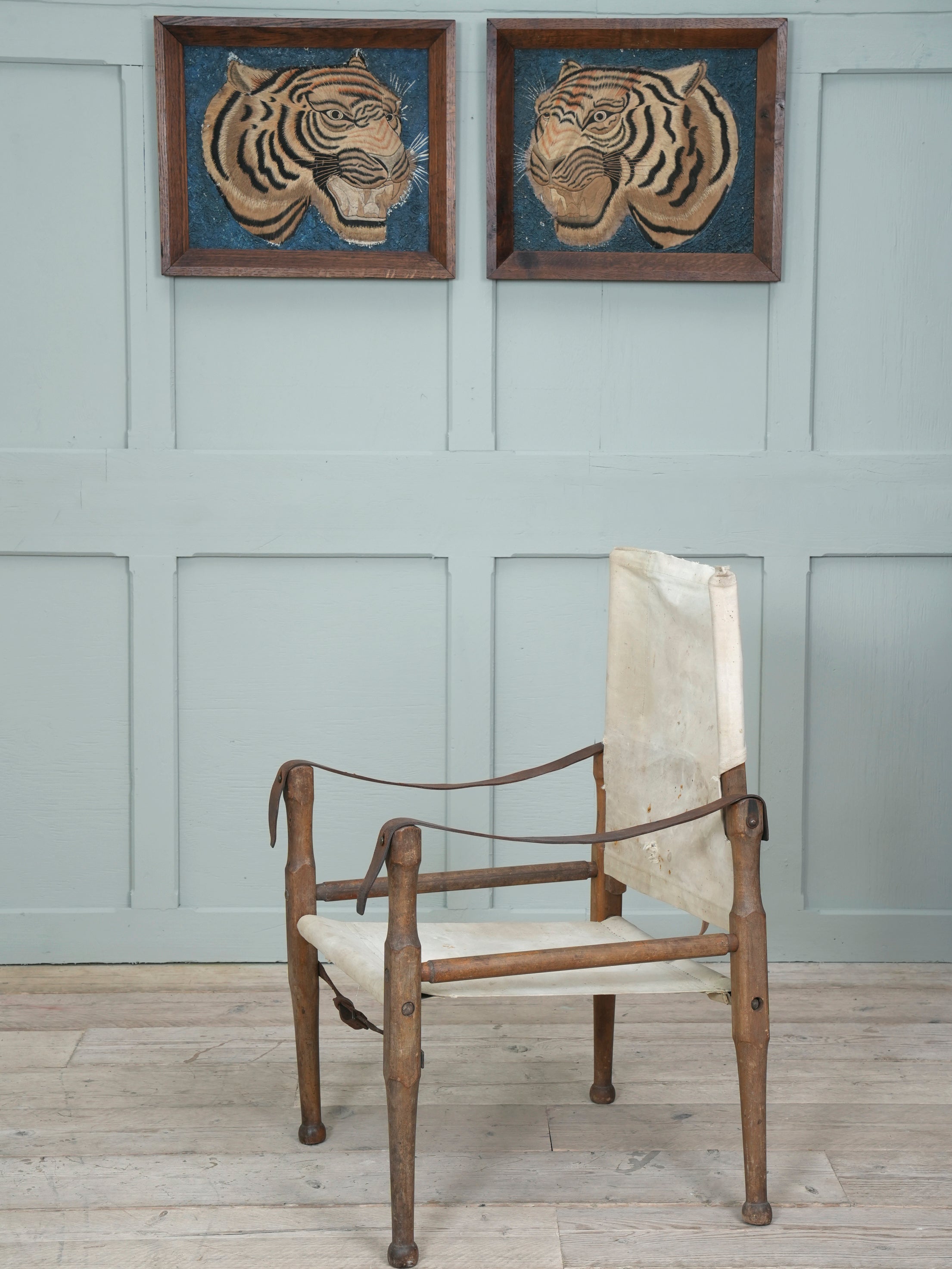 A Pair of Framed Silk Embroideries of Tigers Heads