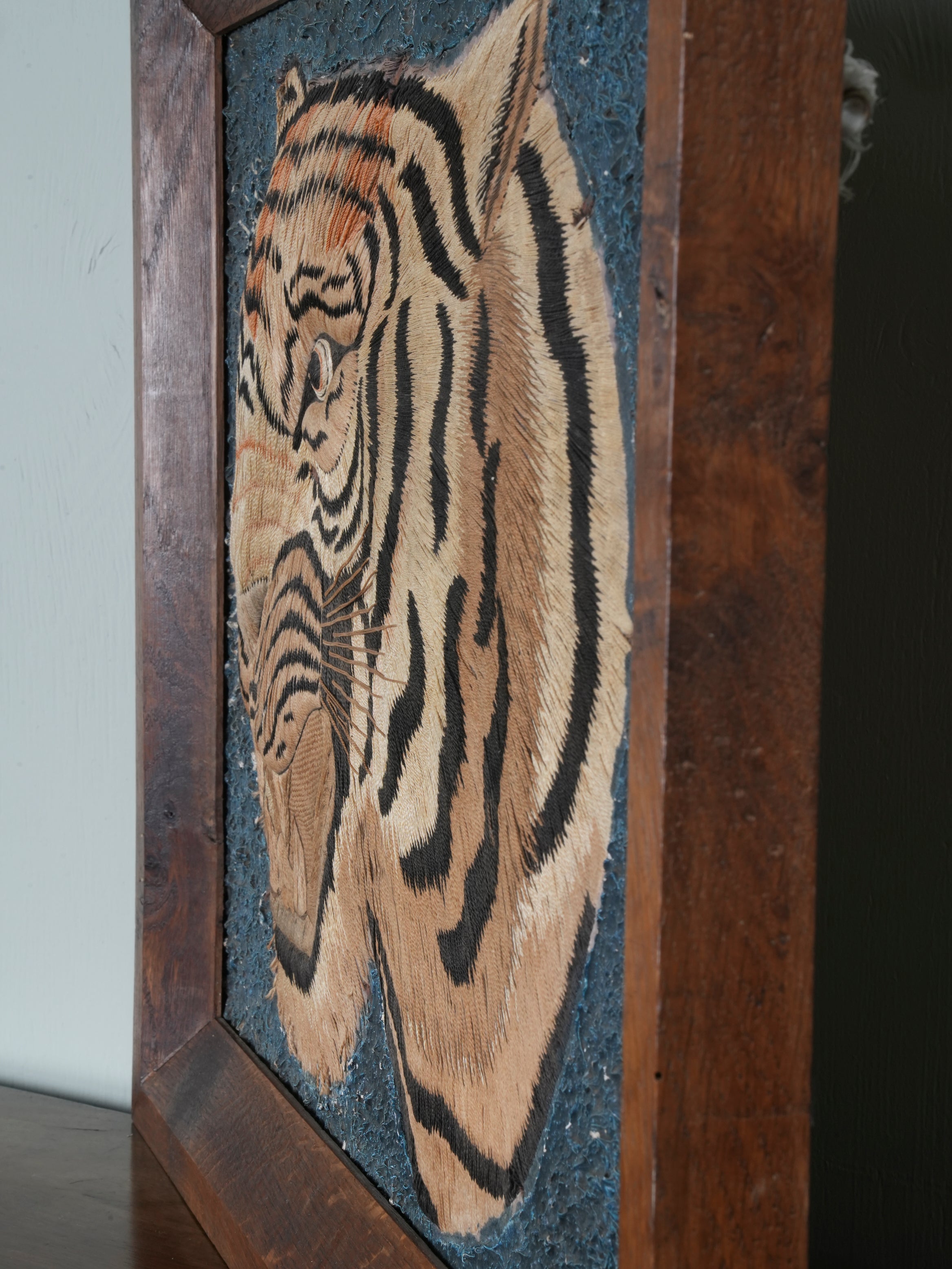 A Pair of Framed Silk Embroideries of Tigers Heads