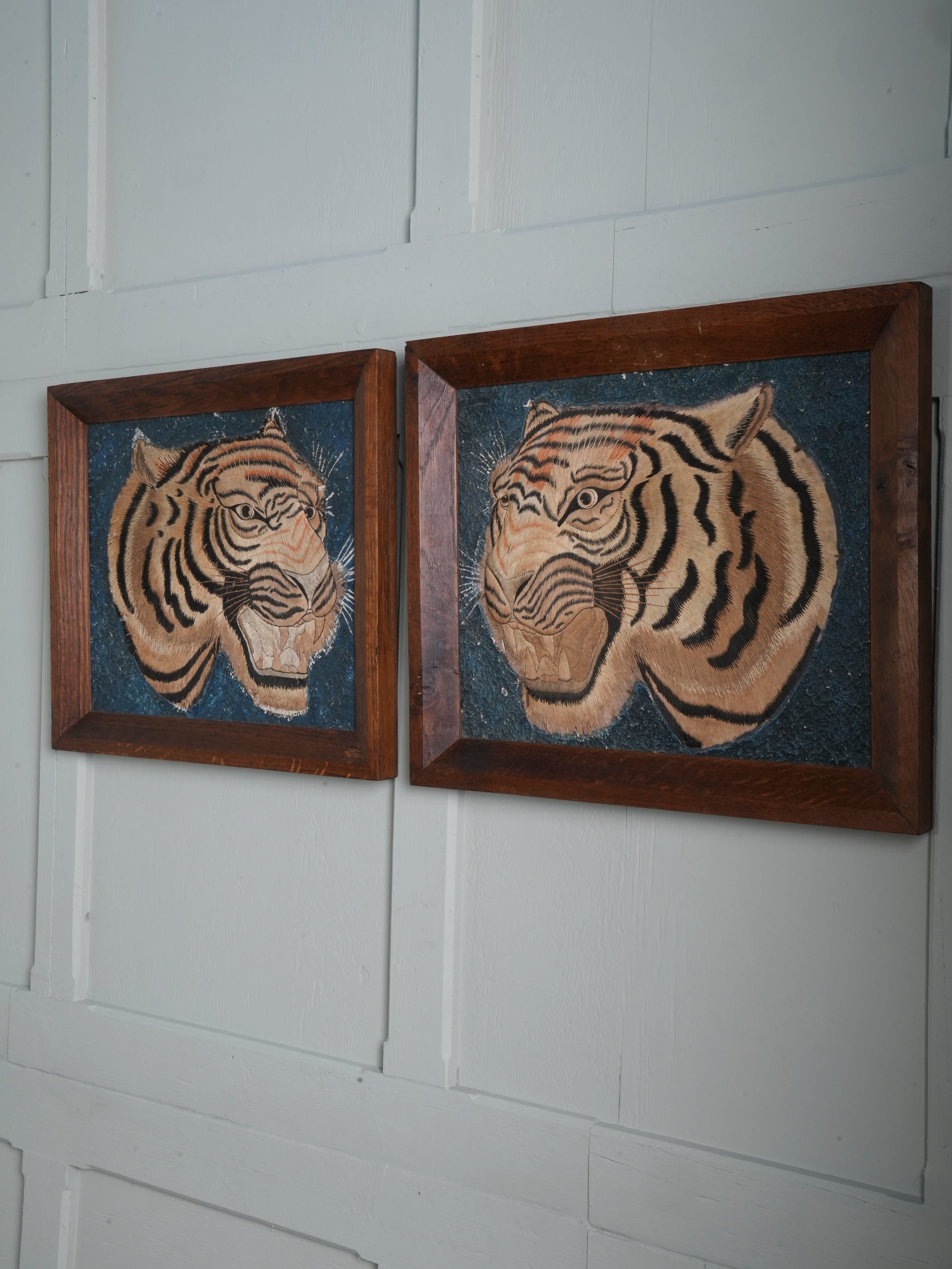A Pair of Framed Silk Embroideries of Tigers Heads